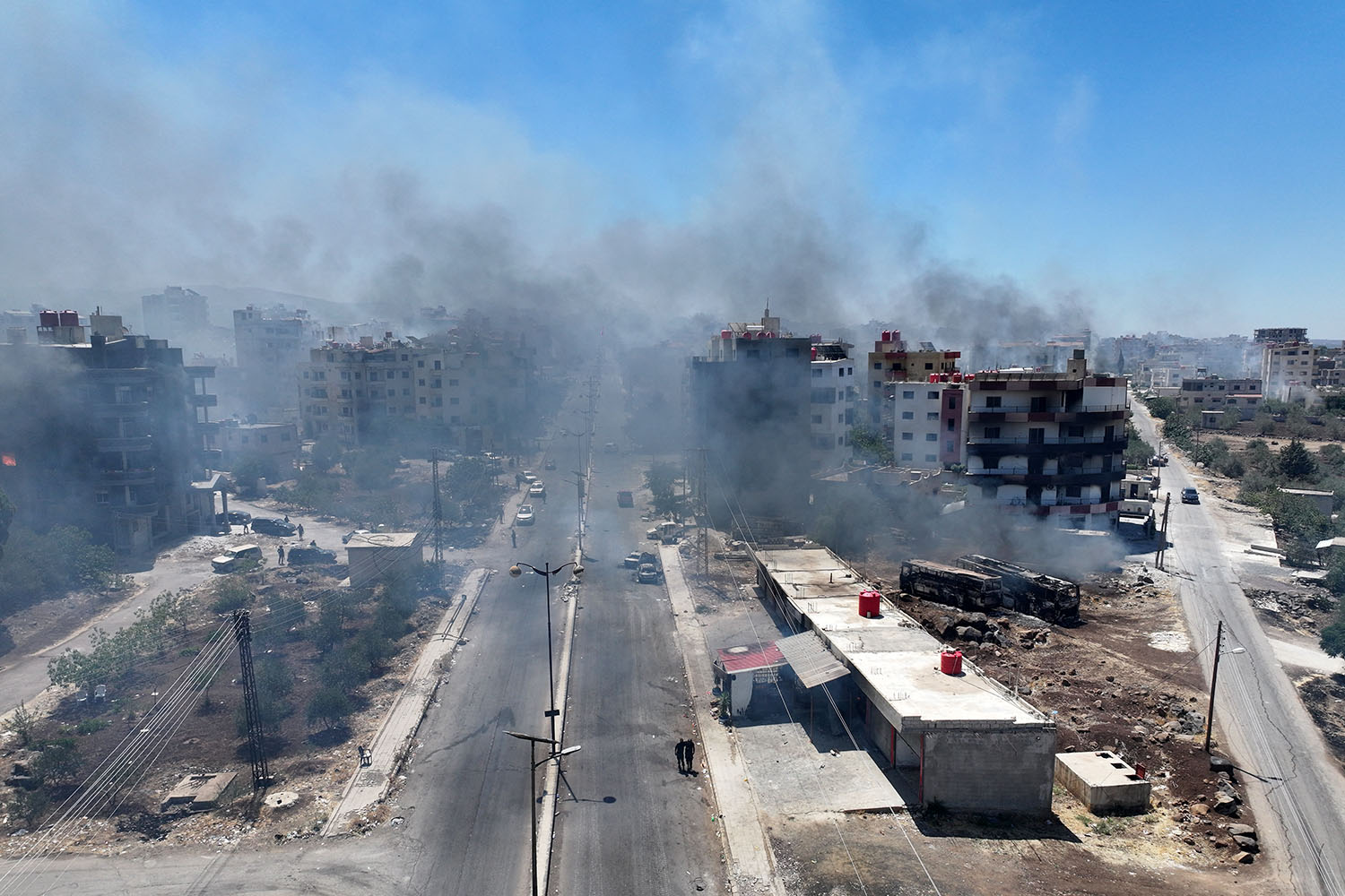 ‘It was horrifying beyond words’: hundreds killed in violence sweeping southern Syria