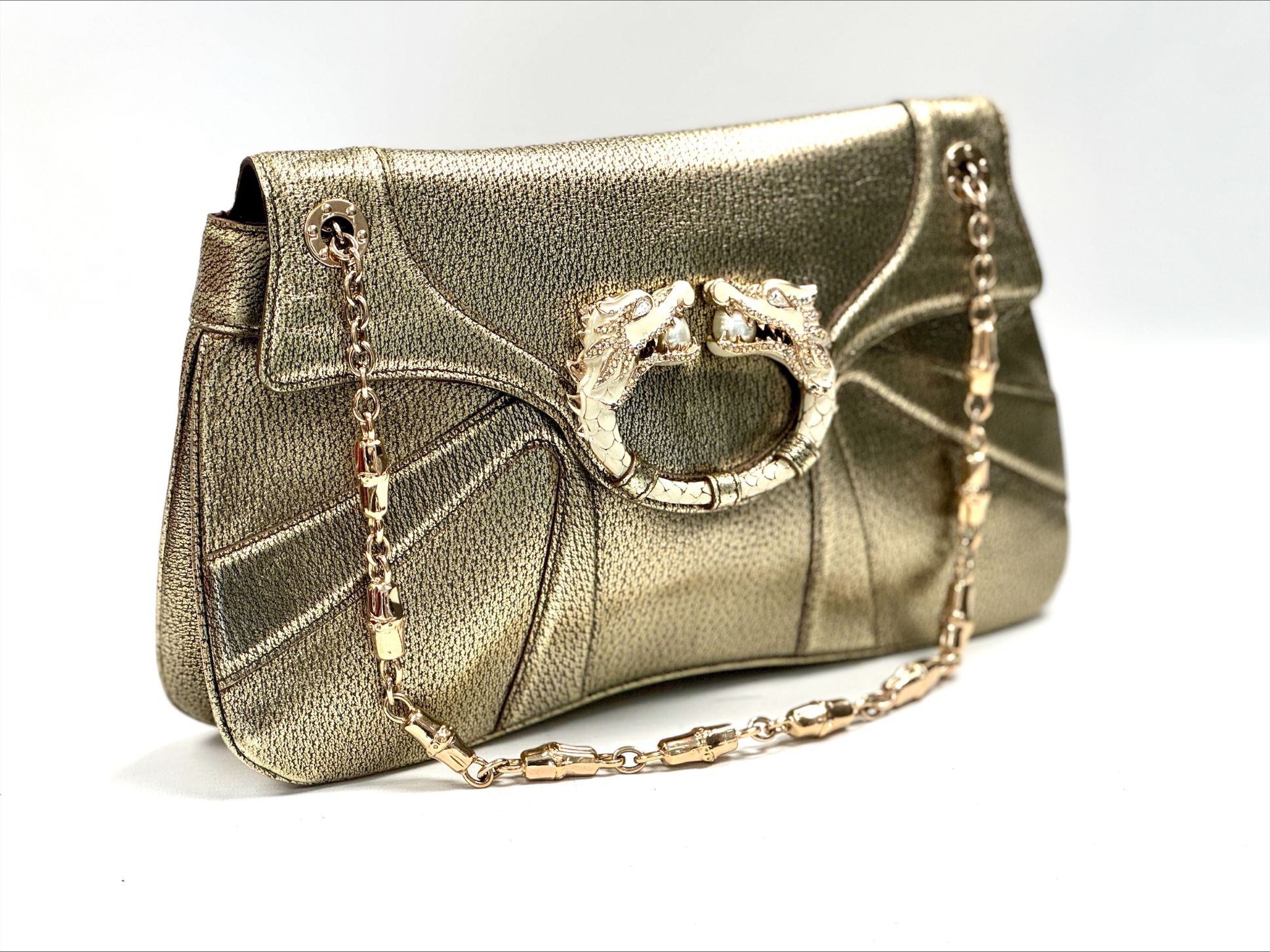 Going, going, gonePick up a designer bargain and help raise funds for The British Heart Foundation in the process via their designer auction with Ebay. Lots include a Tom-Ford-era Gucci gold bag with dragon-head clasp, Prada cherry red slingbacks and Balenciaga speed sneakers. Bidding close at 9pm on 27 July, eBay