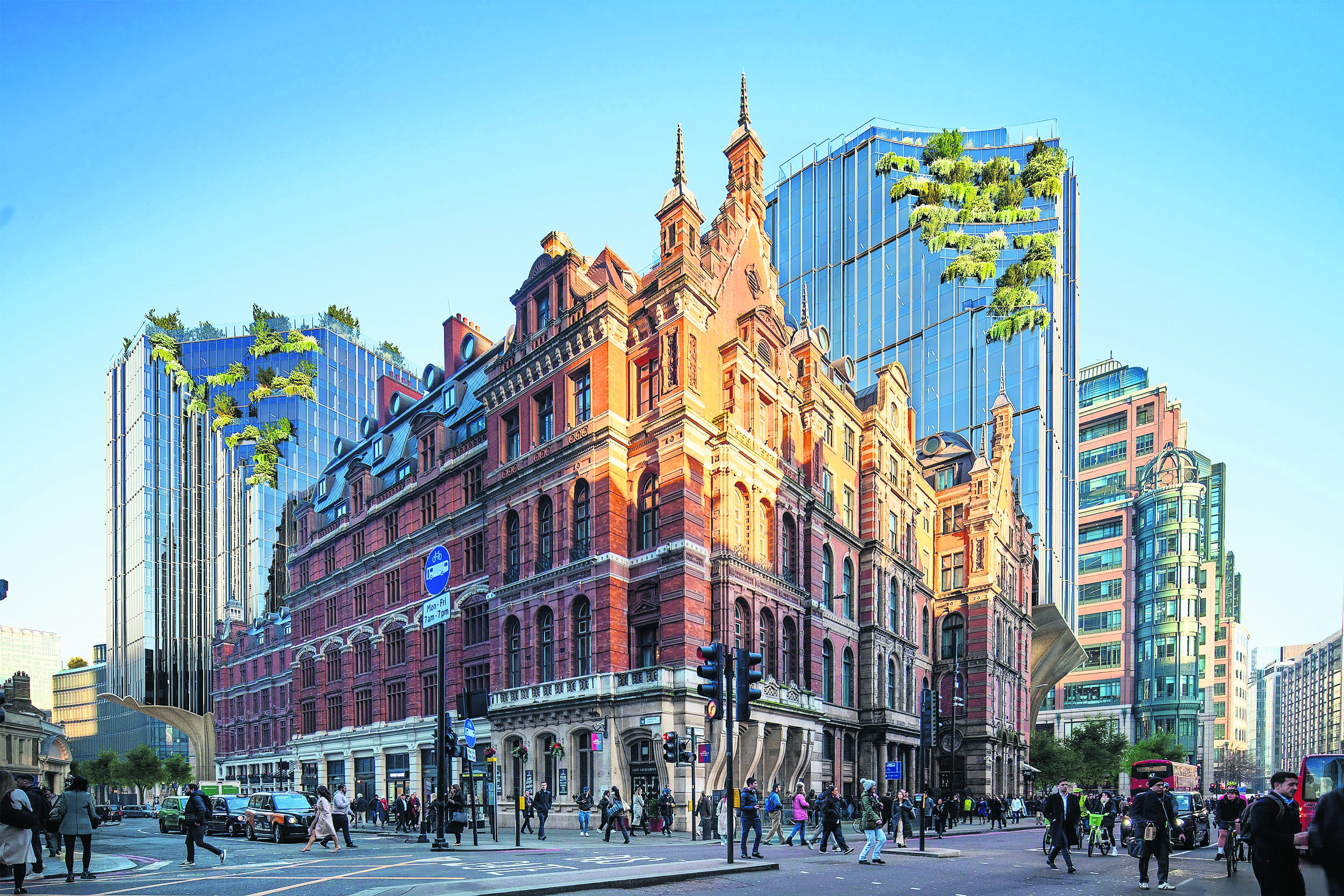 A design shows the George hotel at the entrance to Liverpool Street station, with the commercial buildings behind