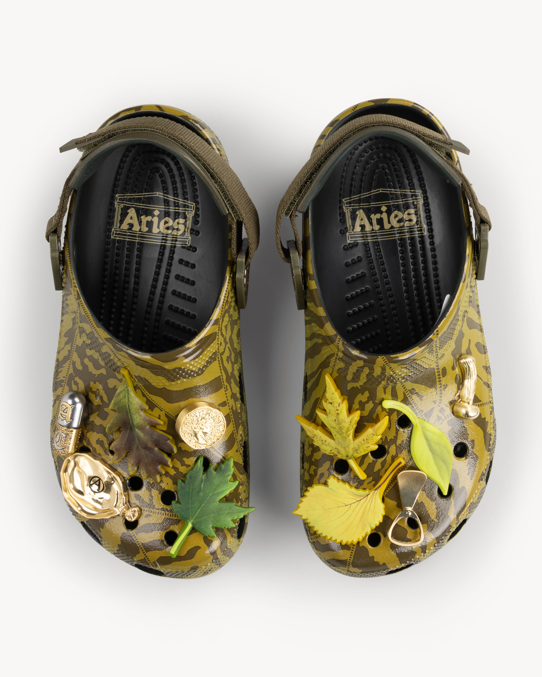 Field tripArie’s latest project with Crocs sees the brand's playful DNA reimagine the classic clog in two camouflage colourways and comes with all-new custom Jibbitz charms including leaves, mushrooms, coins, deflated balloons inspired by “what you might find on a trip in London Fields," says Aries founder, Sofia Prantera. Aries