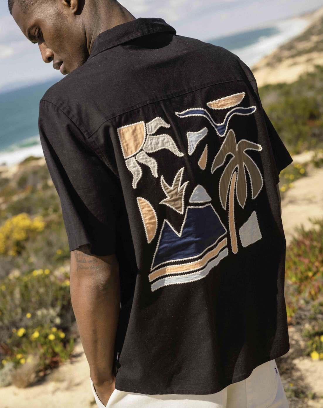 Relax with WaxWax London pride themselves on sustainably sourced style. Highlights for the summer collection include appliqué and embroidered shirts – think relaxed Cuban collars, breathable organic cotton, and subtle statement details that transition seamlessly from departure lounge to destination. £125, Wax London