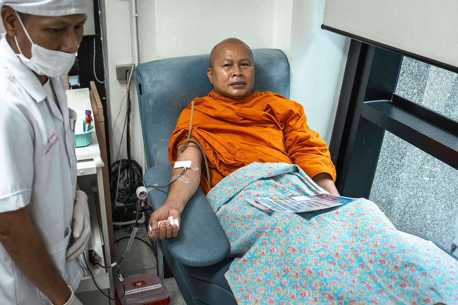 A Thai Buddhist monk donates blood at a Red Cross centre in Bangkok