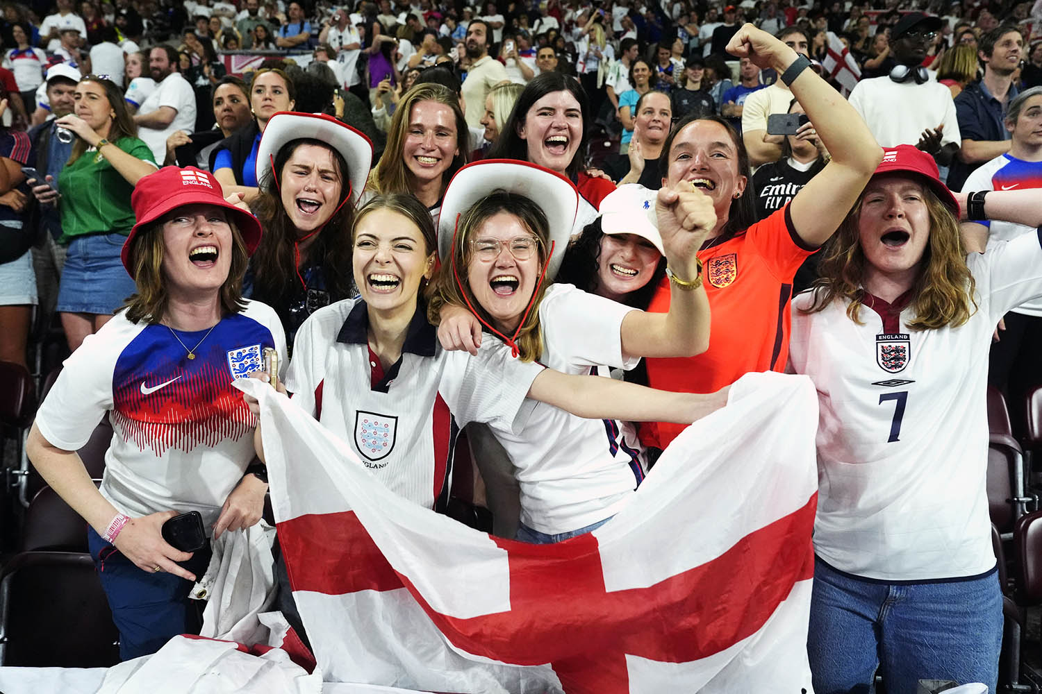 Happy days: fans celebrate the Lionesses’ win against Italy last Tuesday