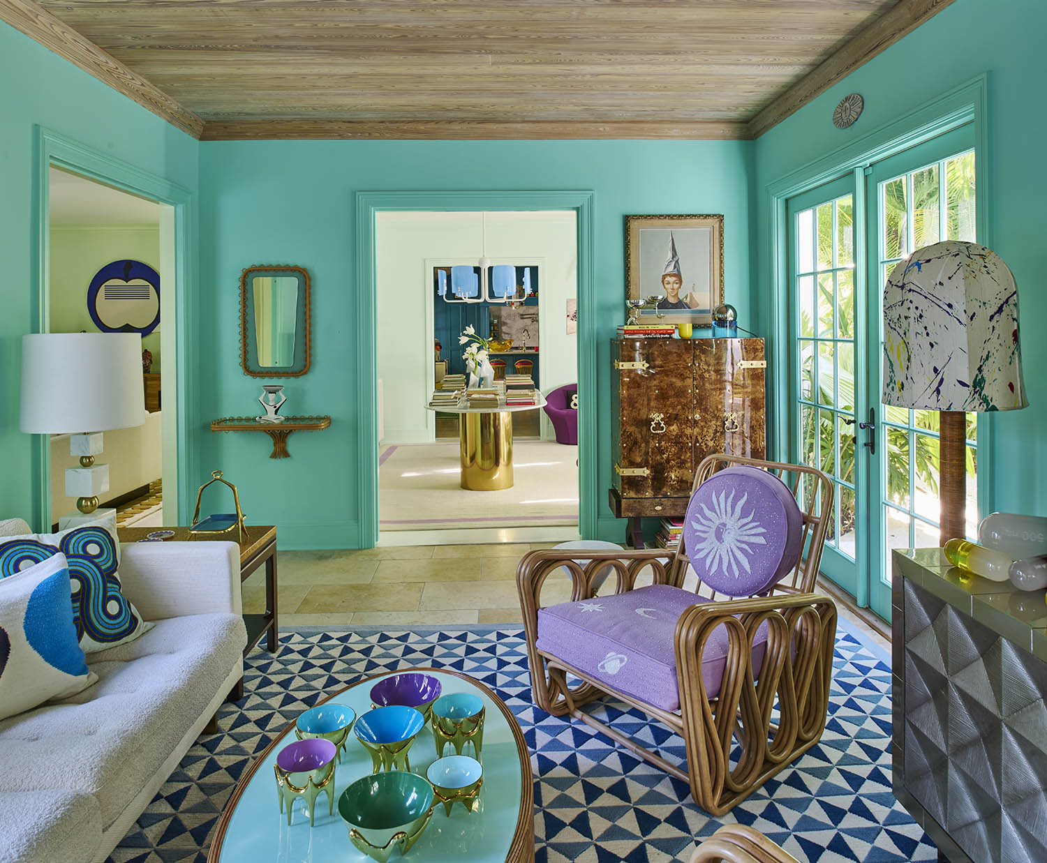 On the bright side: turquoise walls set off the wooden ceiling, while the double doors open into the garden and out on to the pool terrace