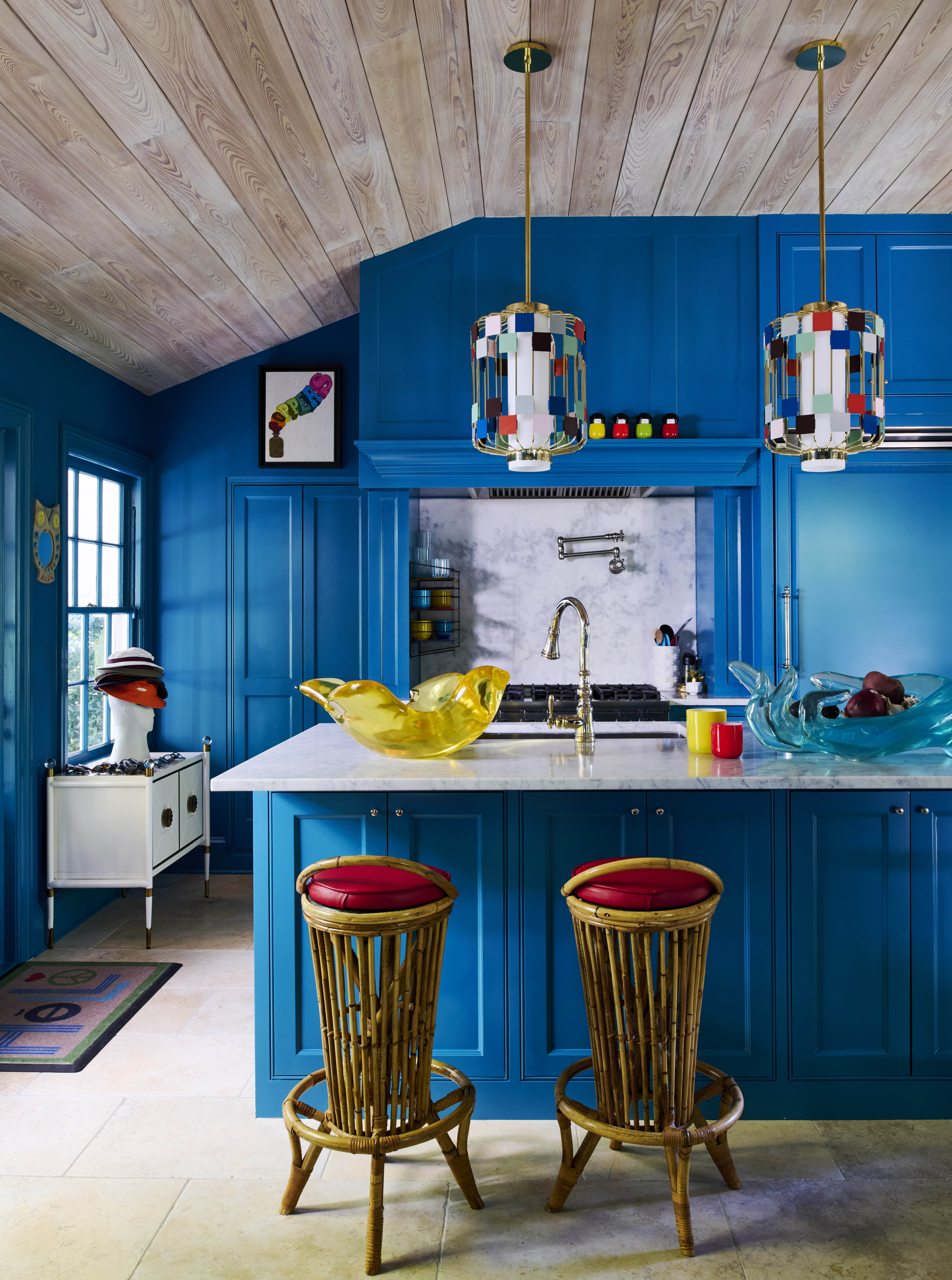 Raise the bar: the kitchen with blue units and vintage French bar stools