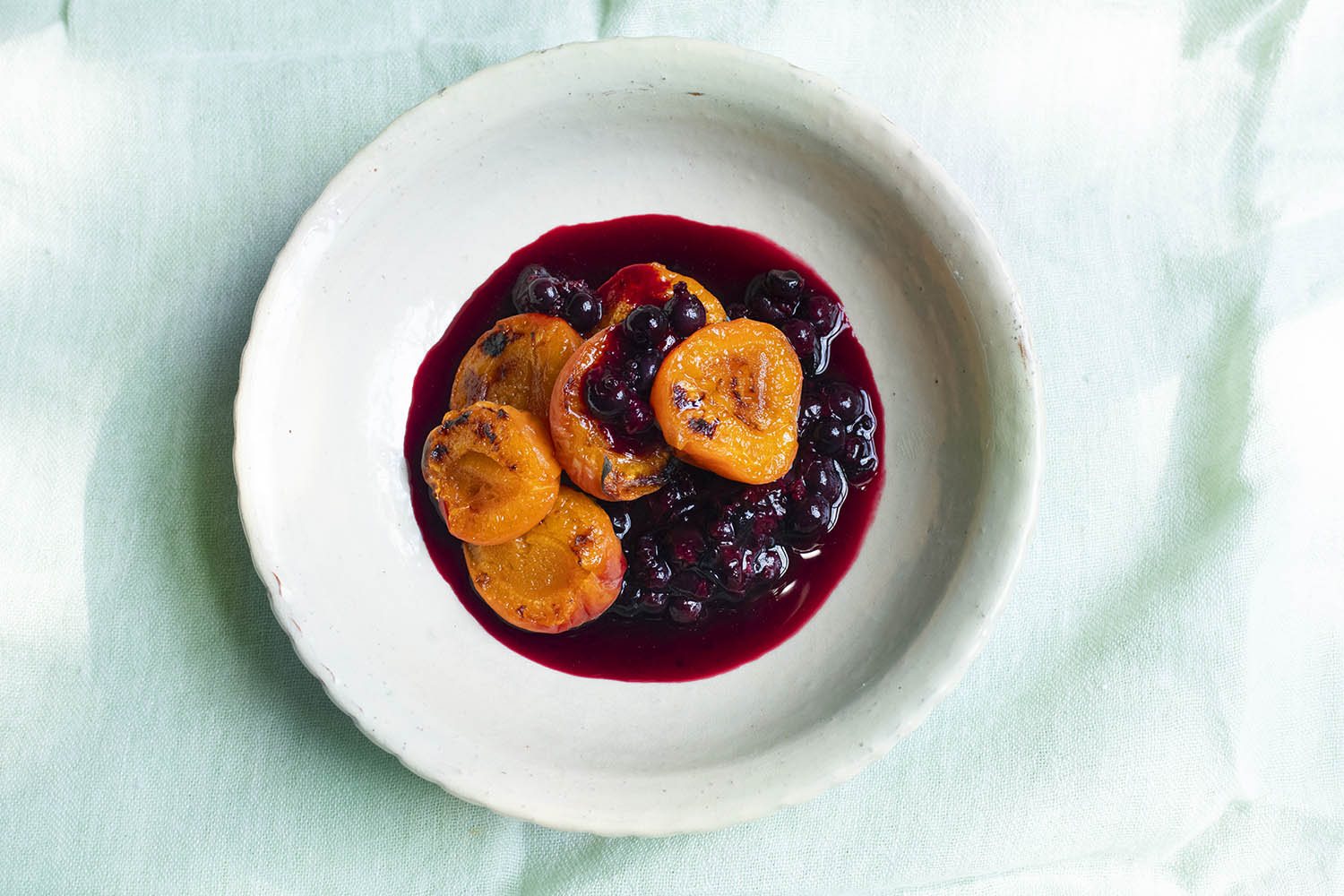Nigel Slater’s midweek treat: grilled apricots, summer fruit sauce