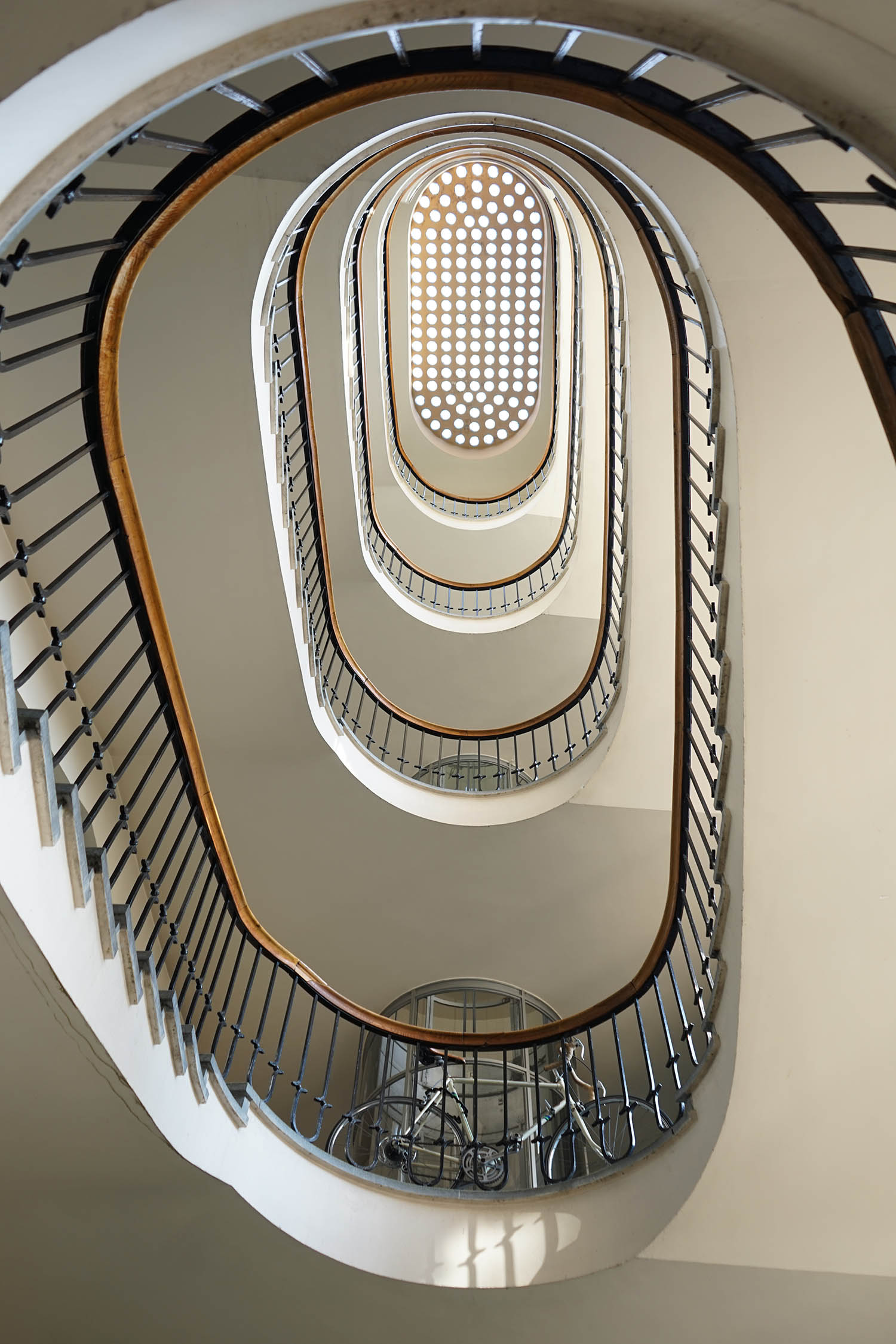 Piston House, a residential building in Budapest designed by local architects Béla Hofstätter and Ferenc Domány, and completed in 1938. ‘It’s on the edge of Art Deco and Modernism,’ says Štěch. The central staircase is its most striking feature, but at the bottom of the photo you can see that the lift is contained within a glass cylinder