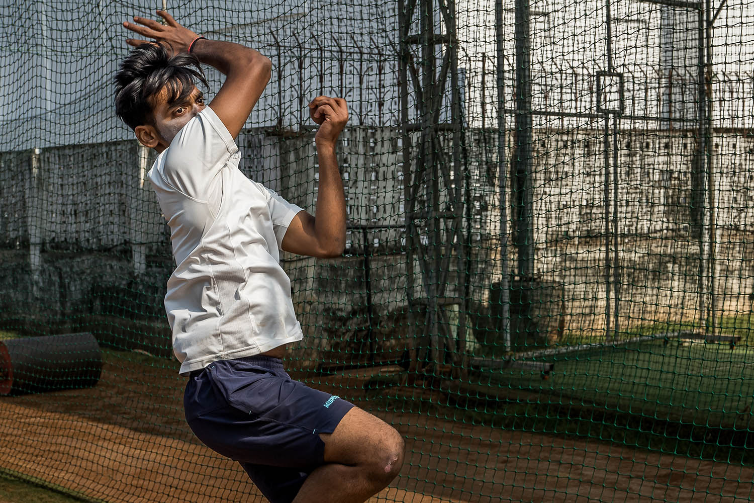 Bowling at the Vasoo Paranjape Cricket Academy in Mumbai
