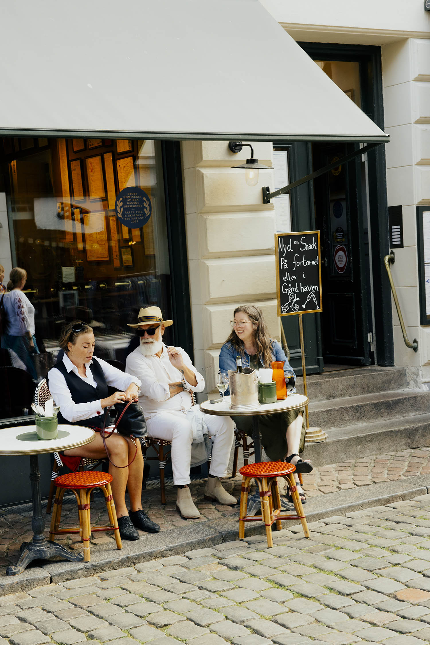 Stop for a chat: relaxing outside Mefisto Restaurant