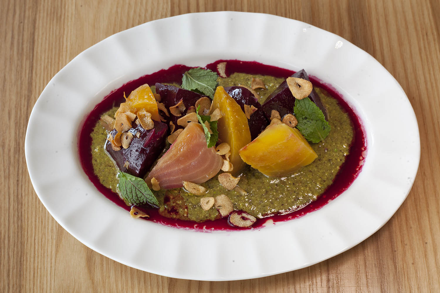 ‘A kaleidoscopic toppled henge’: beetroots, pistachio, fried garlic, and mint
