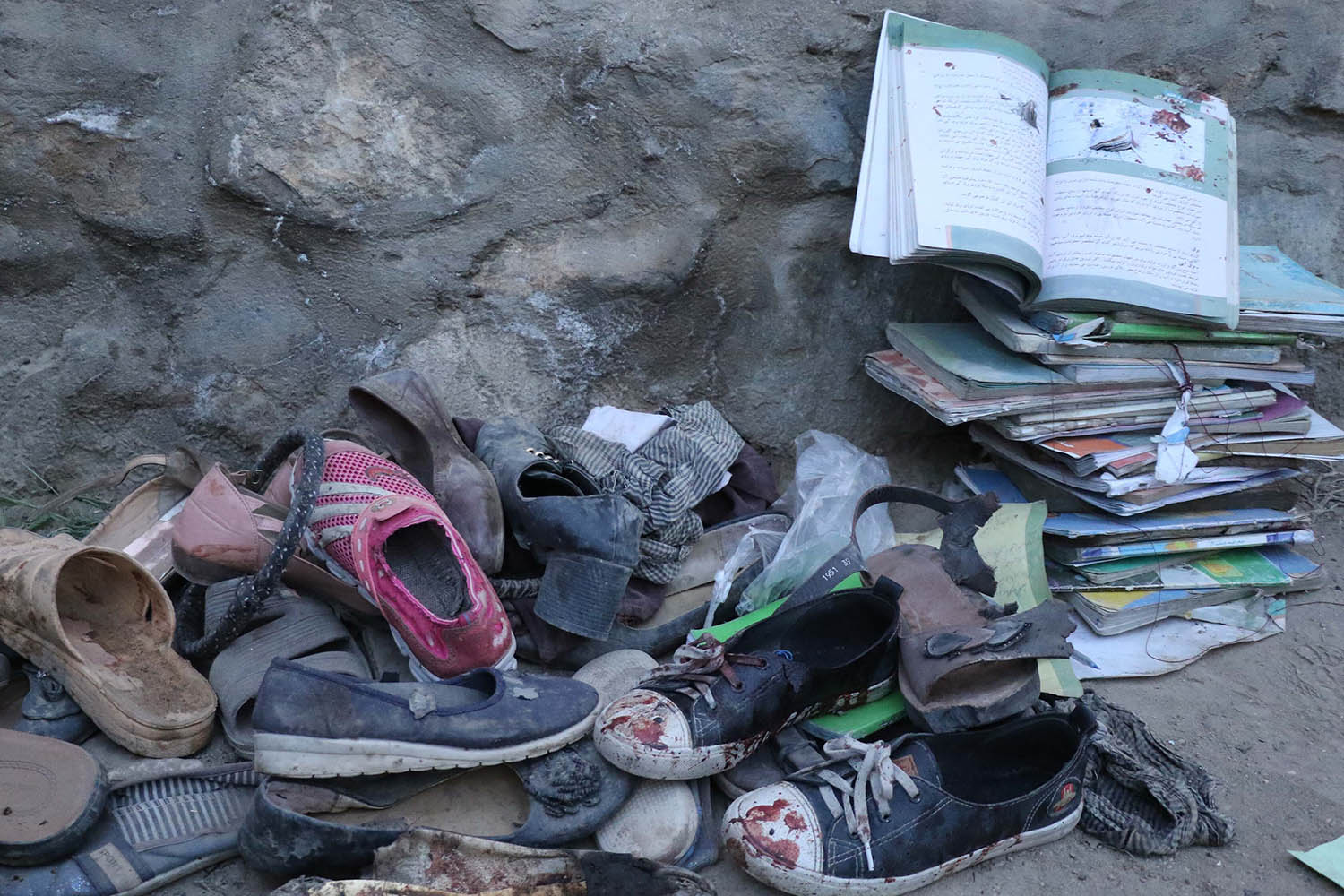 Schoolgirls’ possessions after the bombing of a school in Kabul in May 2021