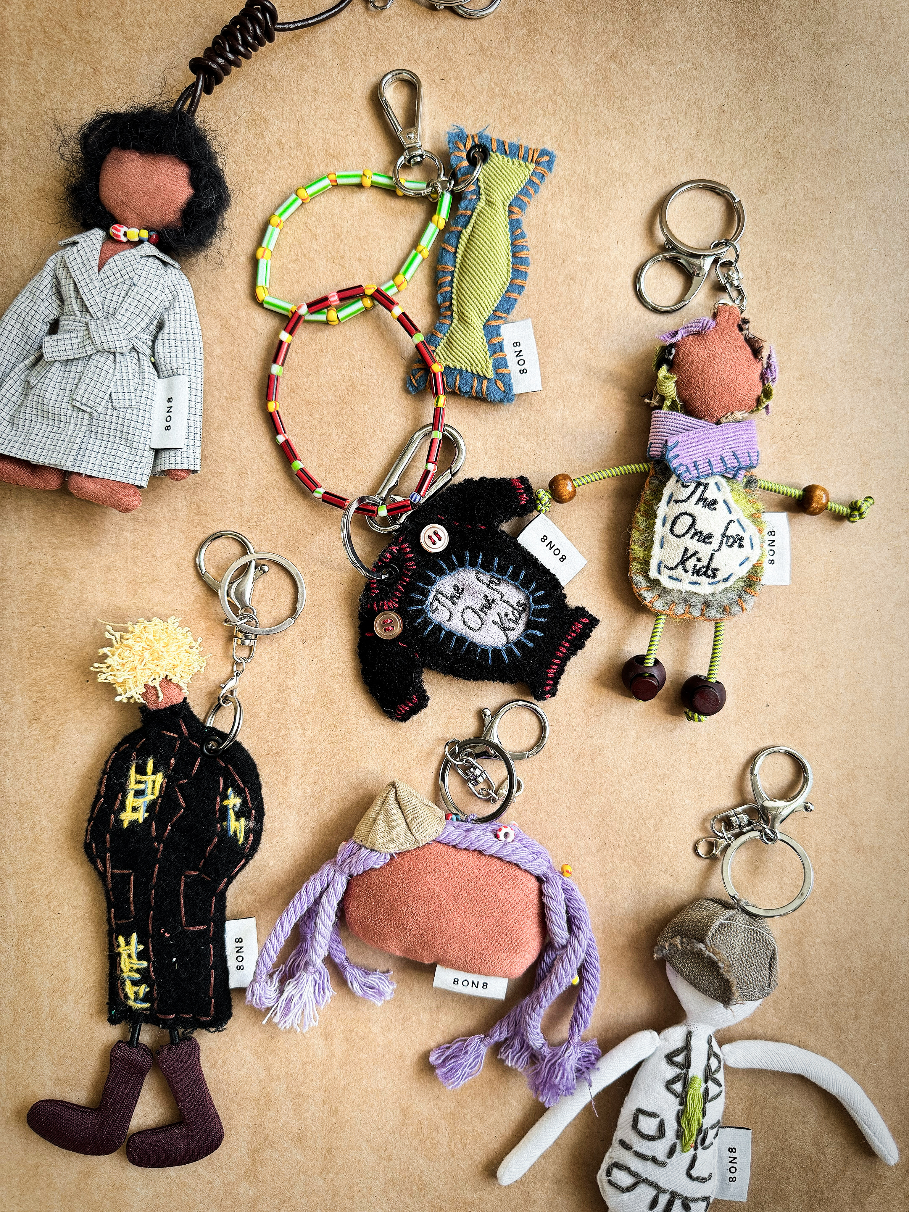 Labubu who?Menswear brand, 8ON8, is marking its eighth birthday with the 8 Years of 8ON8 collection, an initiative that breathes new life into archival fabrics through limited-edition accessories and apparel. Established in 2017 by Central Saint Martins’ MA Fashion graduate Li Gong, 8ON8 is known for it’s contemporary and  colourful menswear. The collection features exclusive keychain designs, each crafted from reclaimed materials spanning the brand's eight-year history. Another highlight worth mentioning is the anniversary white tee, featuring a curated selection of 8ON8's most iconic graphics from past seasons. Every piece embodies the brand's commitment to reducing waste, while celebrating its design legacy. Bag charms, from £39.04, 8ON8