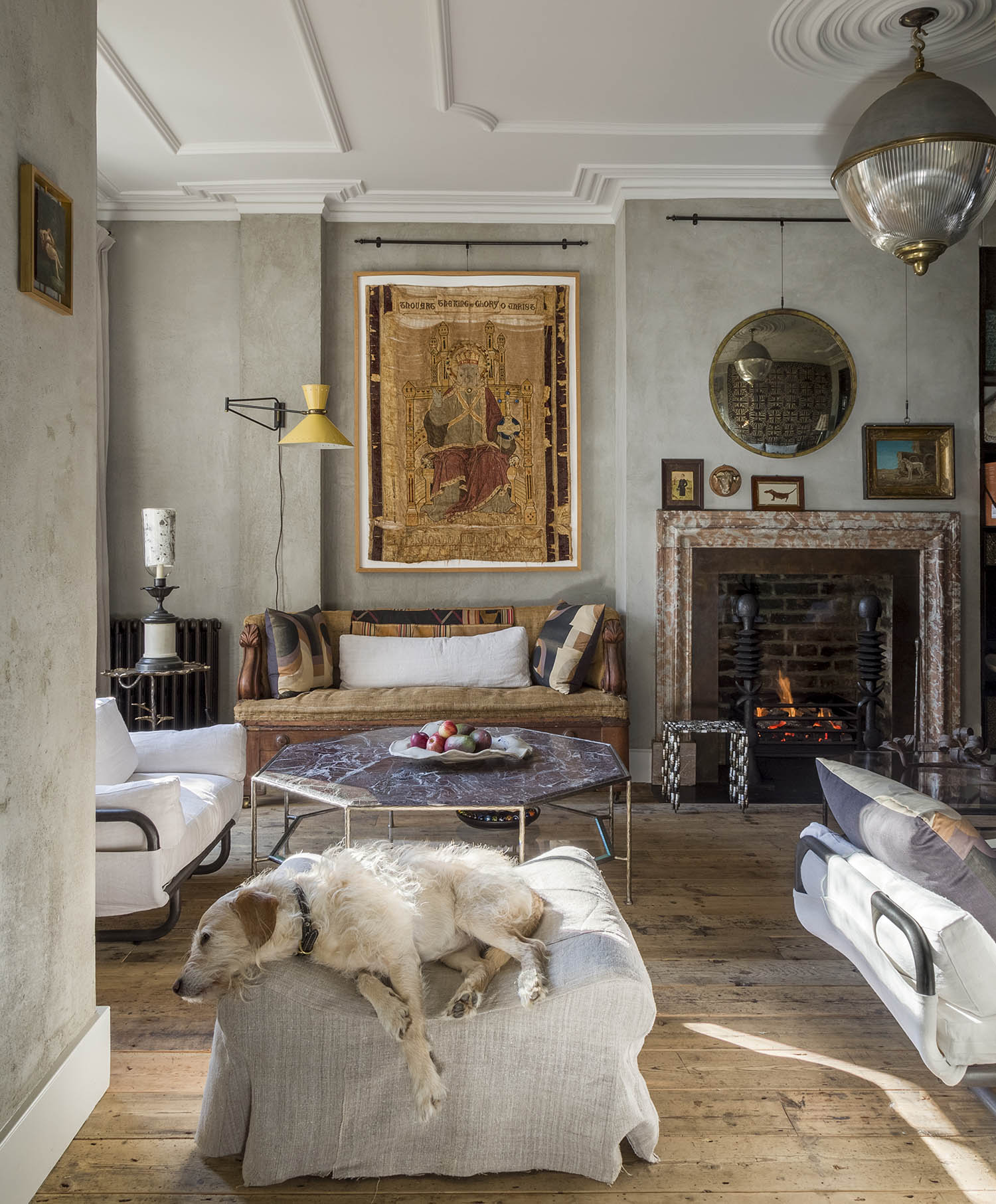 And relax: a marble fireplace adds warmth in the dog-friendly sitting room