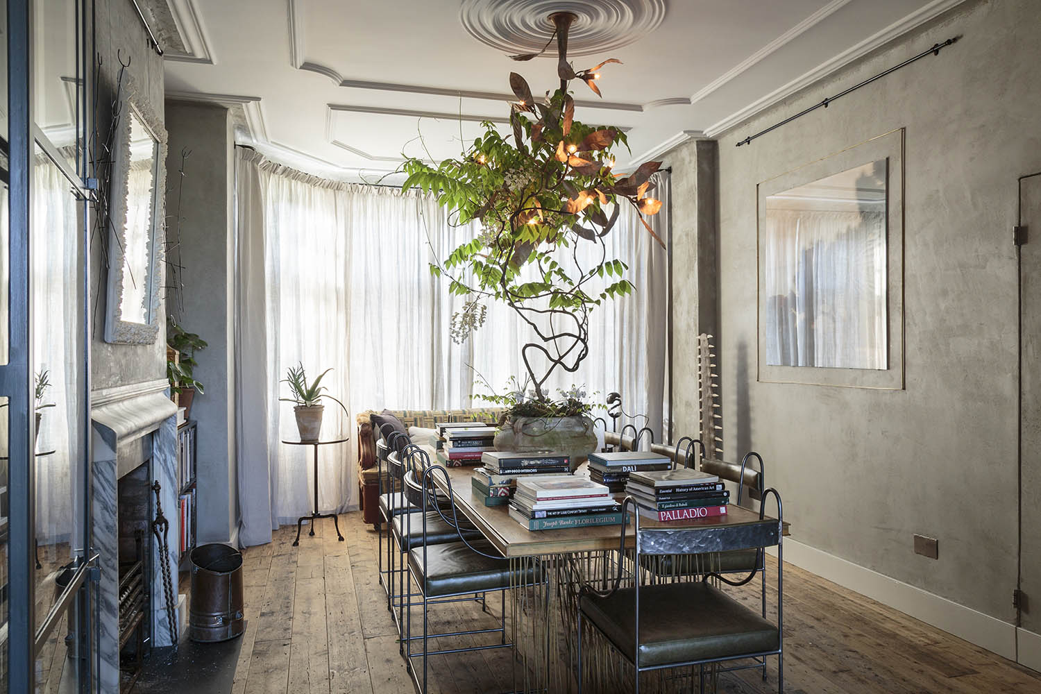 Gardenscape: the dining room features a magnolia-tree chandelier and reed-bed table