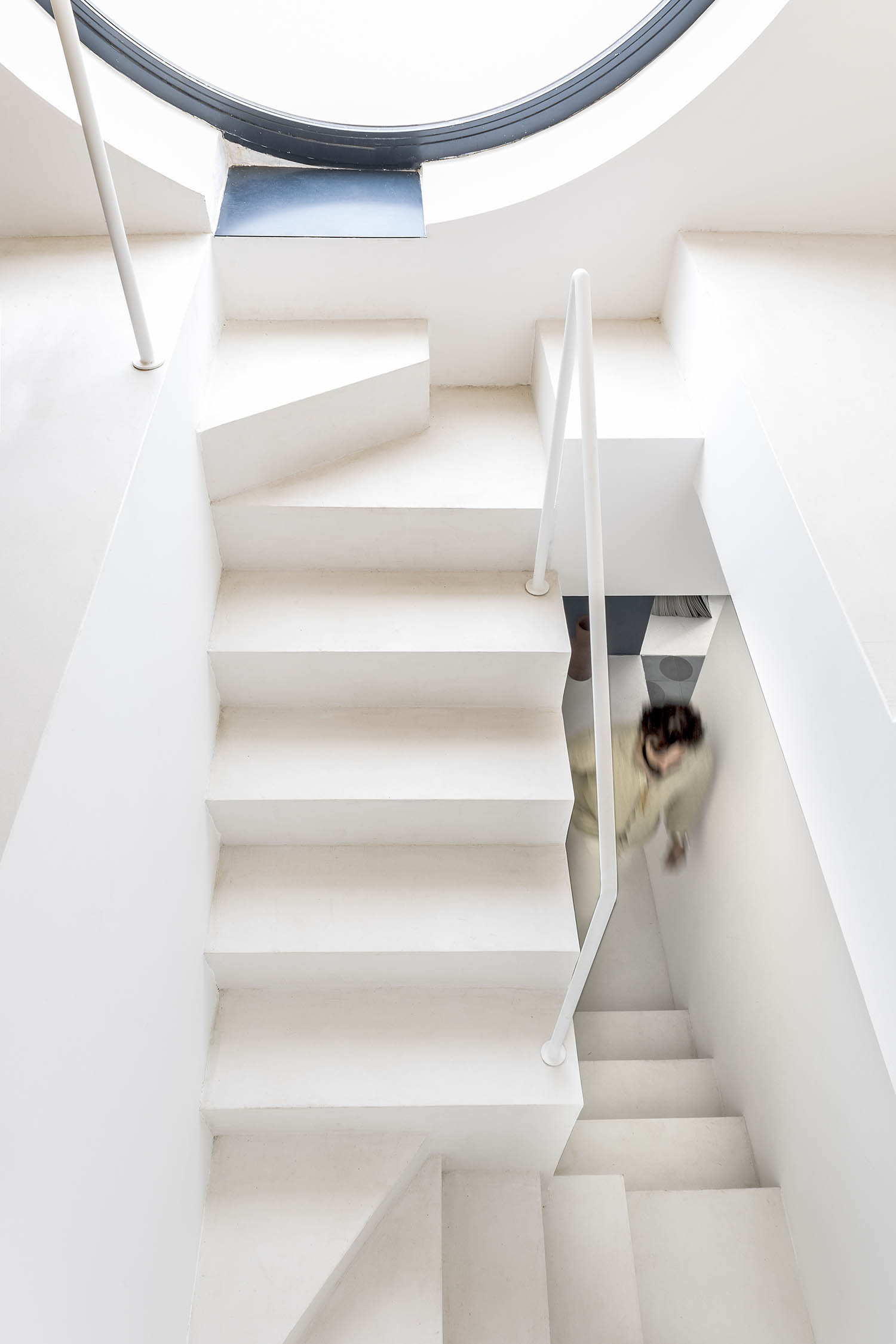 On the way up: stairs leading up to the porthole window