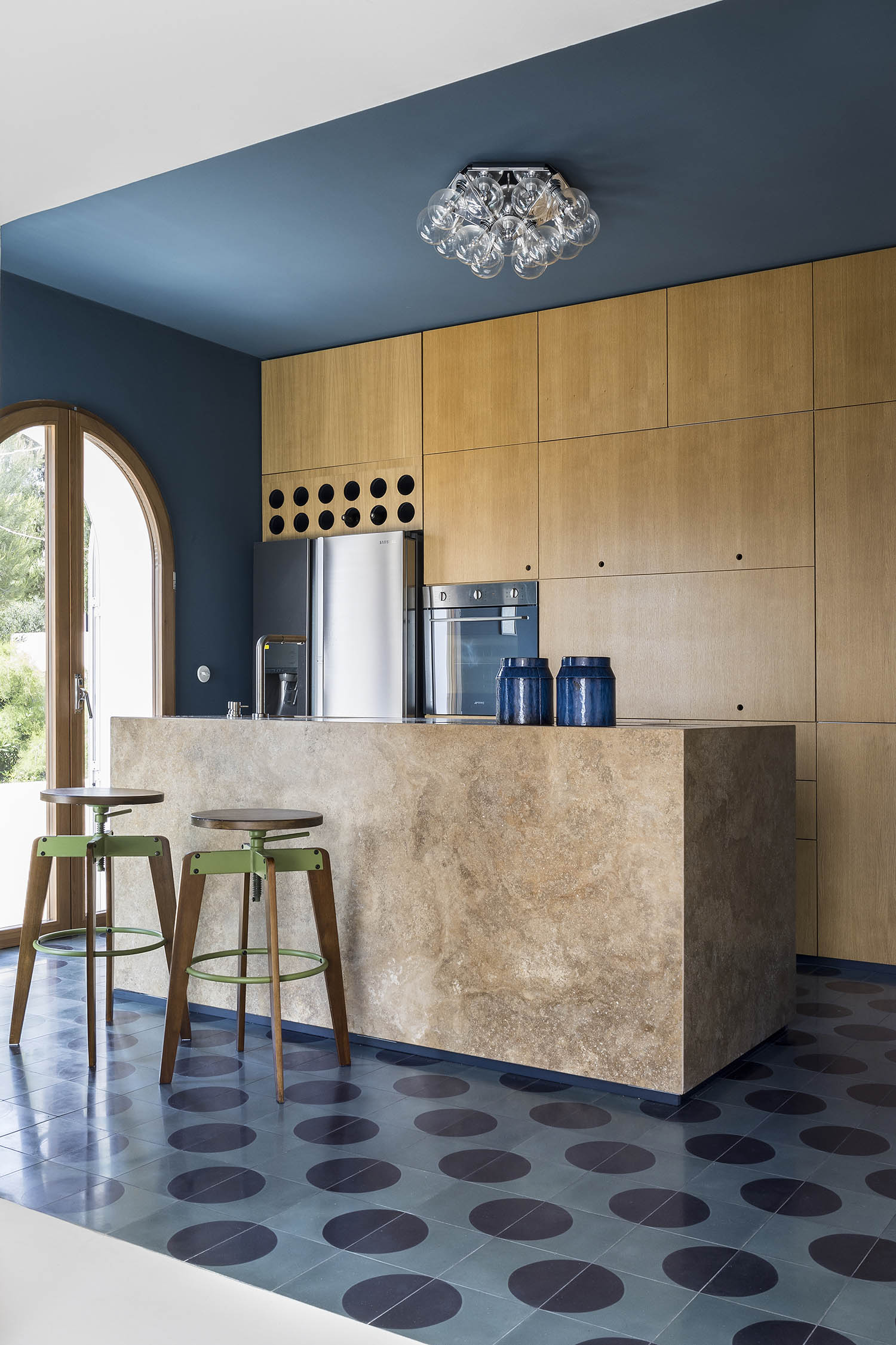 Holding pattern: the kitchen with oak fittings to offset the blue scheme