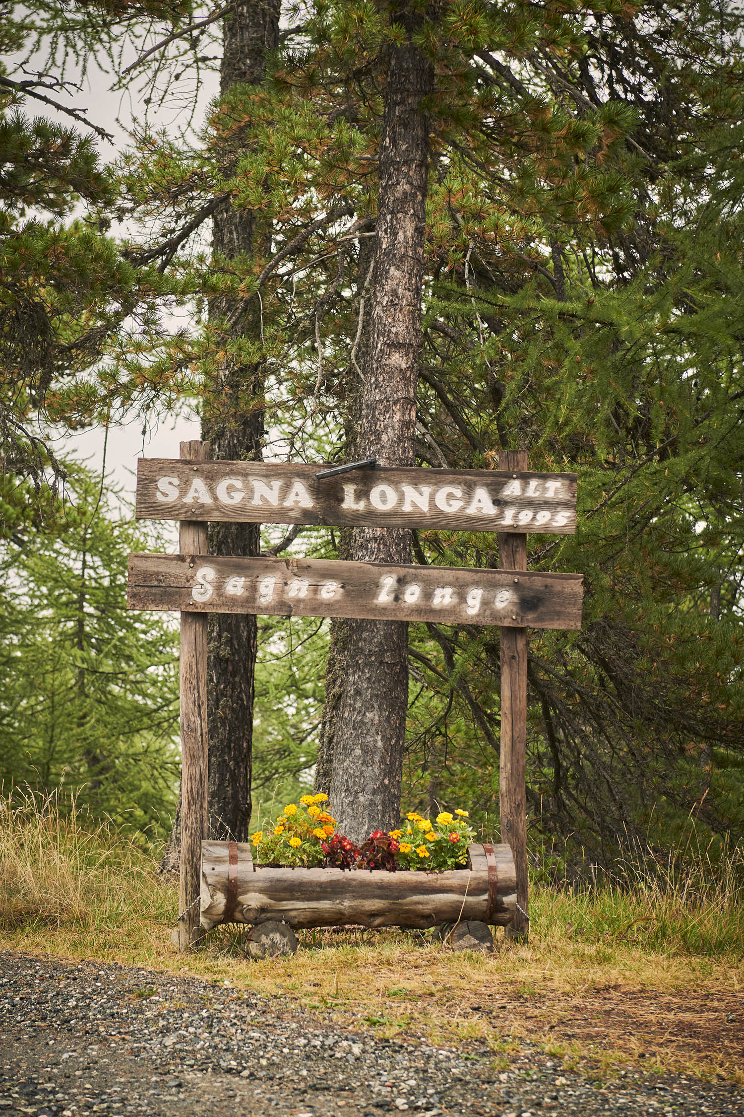 Visitors’ welcome: a sign showing the height of the town. The track is only really accessible during summer months