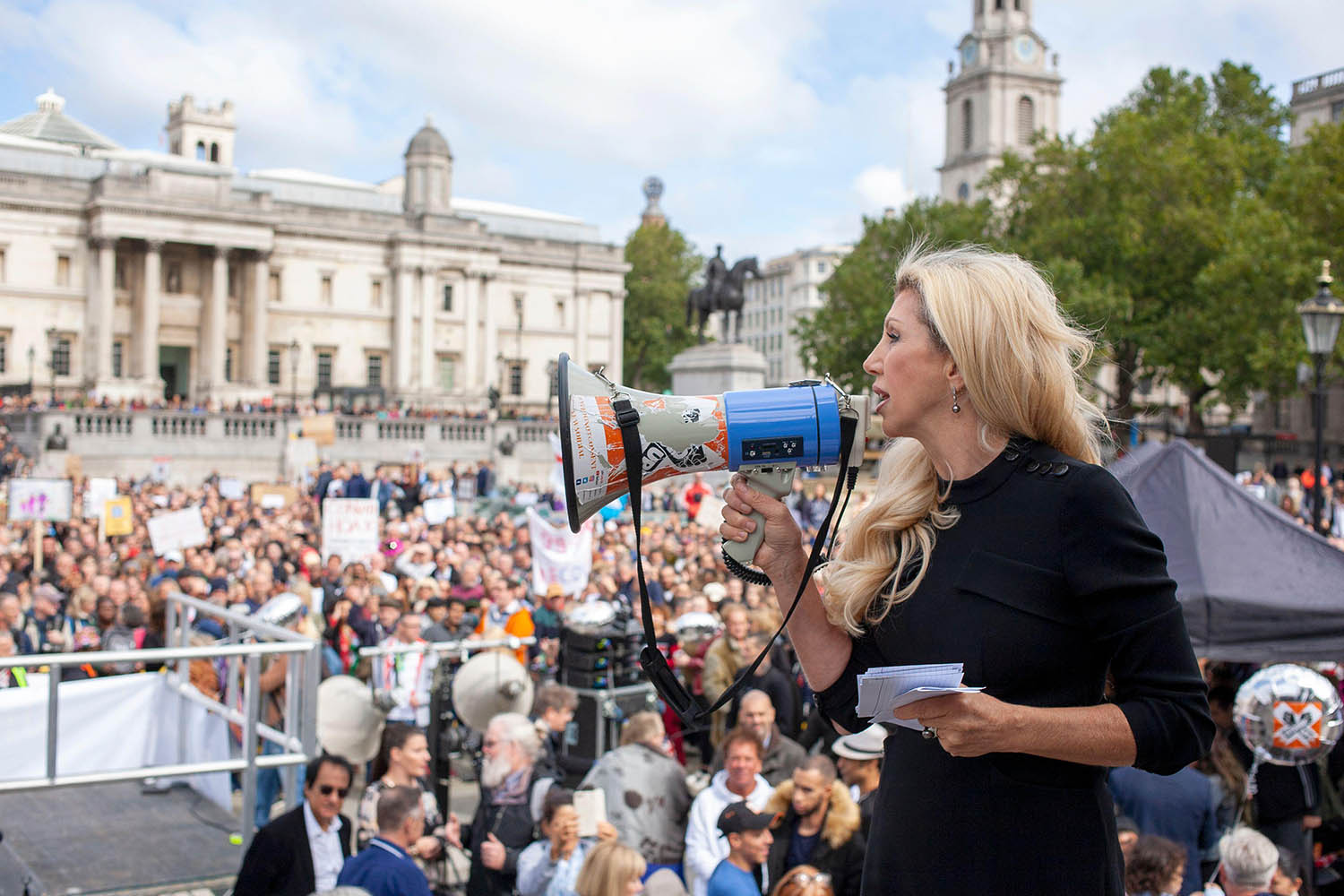Kate Shemirani addresses crowds at a Unite for Freedom rally in London against lockdowns and mandatory vaccines in 2020