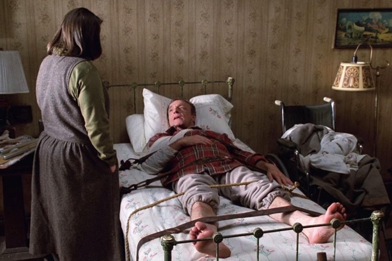 Kathy Bates and James Cann in Misery (1990).