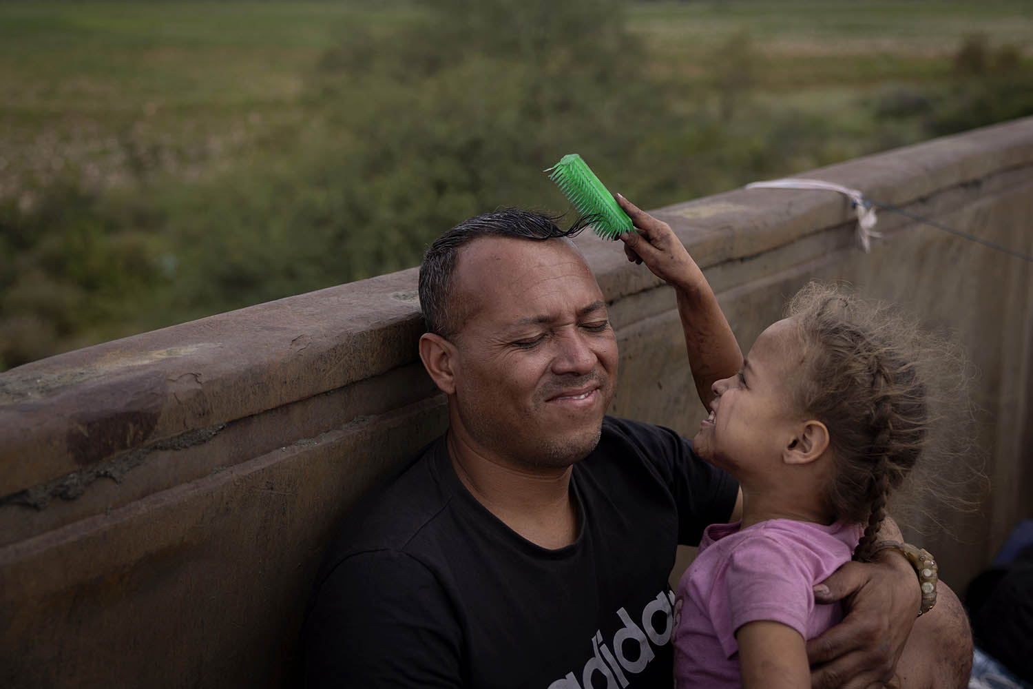 Jean Carlos Rivero, 41, from Venezuela plays with his five-year-old daughter Jeannella Isabela