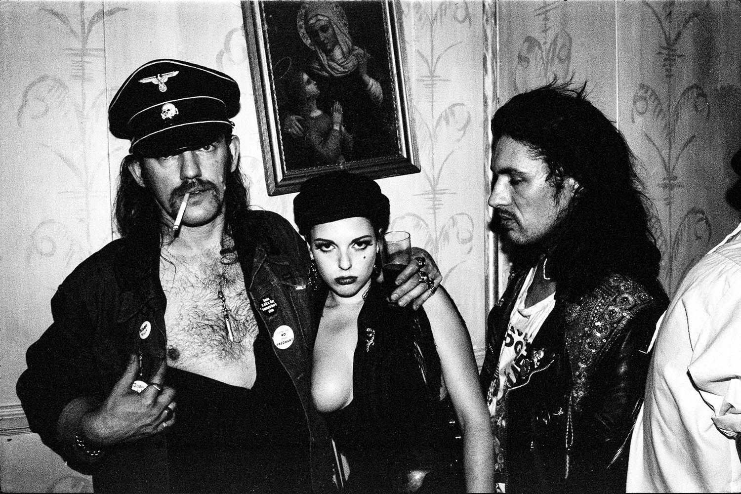 Motörhead’s Lemmy and his girlfriend at the Limelight, with Mark Manning of the band Zodiac Mindwarp and the Love Reaction. © David Koppel