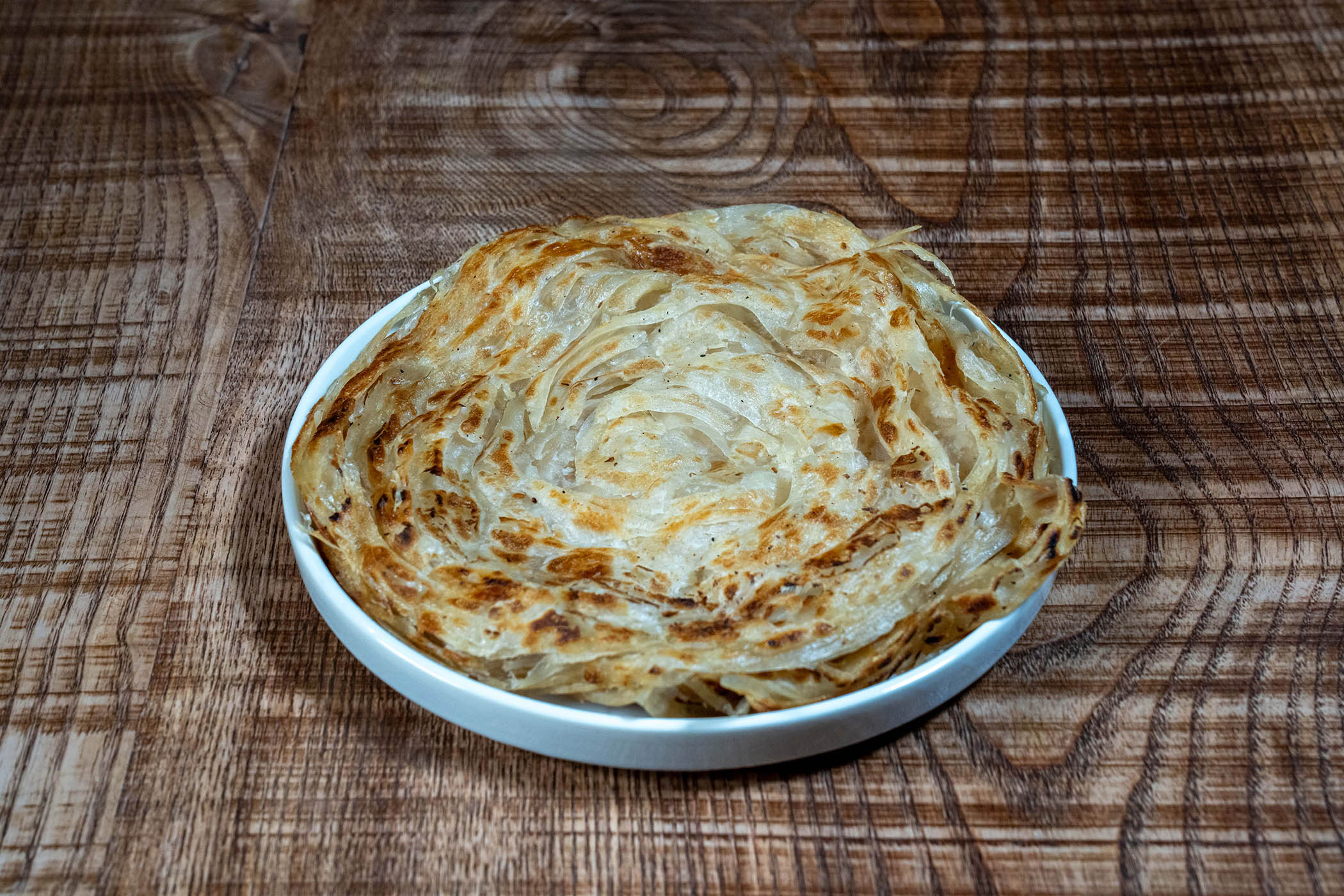 ‘Soft, stretchy and butter-layered’: Malabar paratha