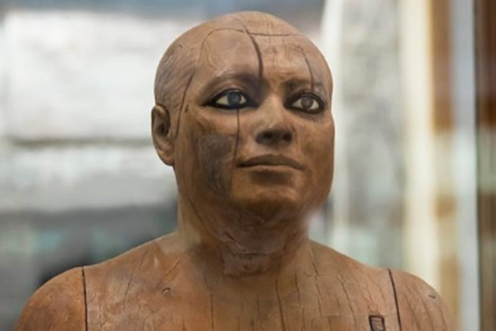 A hyperreal statue carved in wood