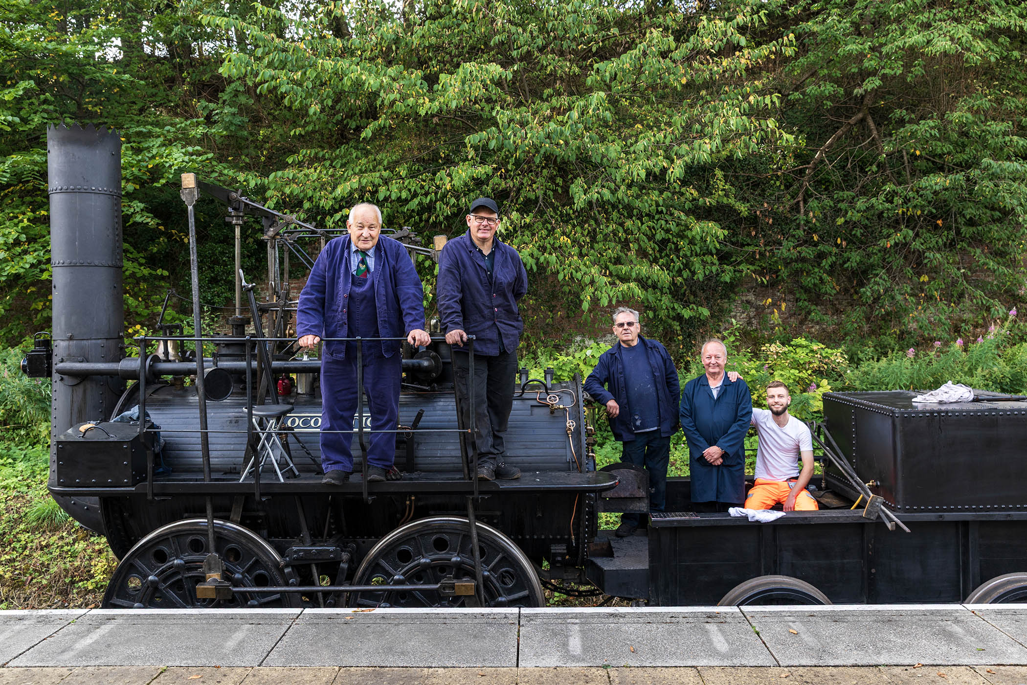The crew of the newly restored Locomotion, including driver Charles Cubitt, far left, take a break at Wolsingham station