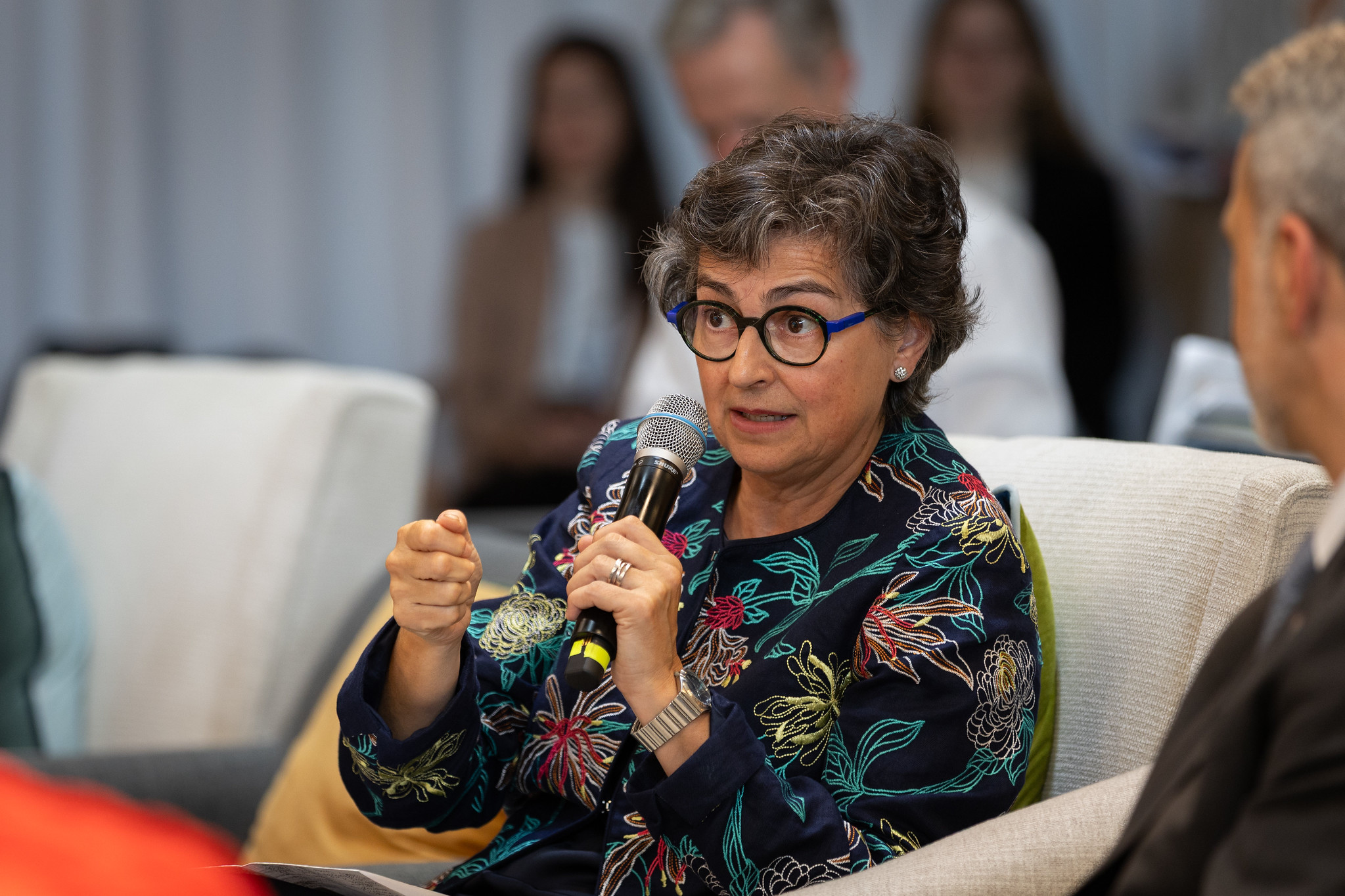 Arancha González Laya speaking into a microphone