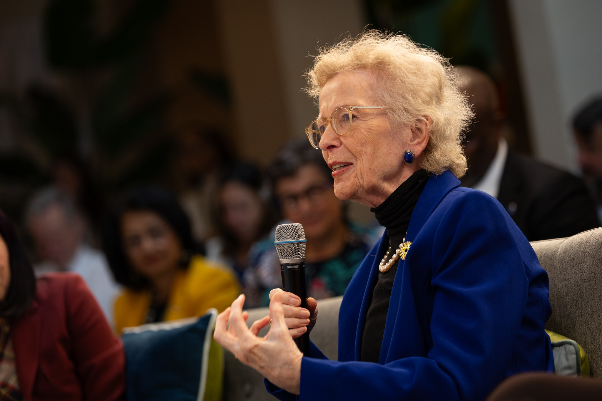 Mary Robinson speaking into a microphone