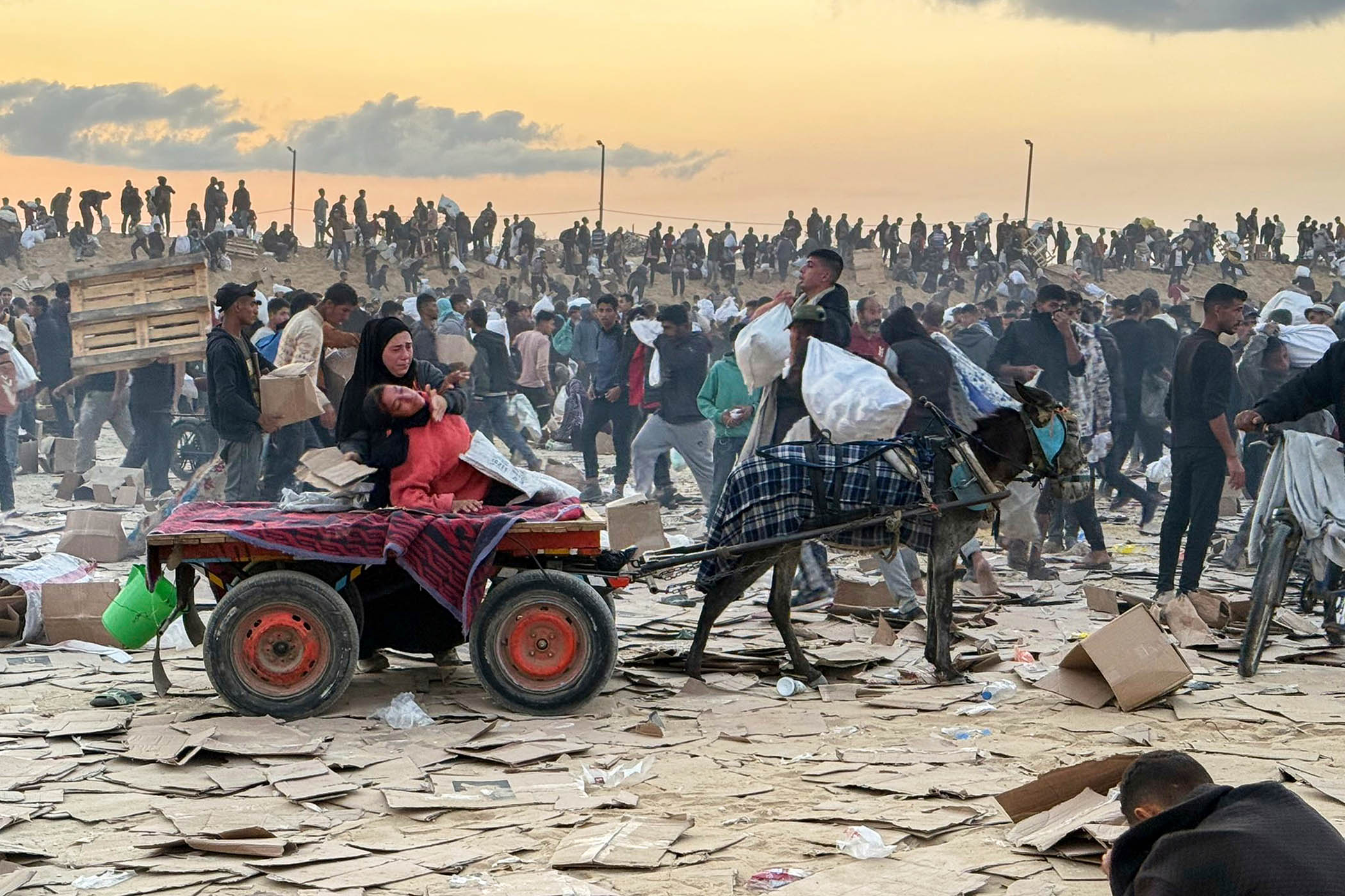 ‘Damn, boy, I think you got one’: inside Gaza’s deadly aid distribution centres