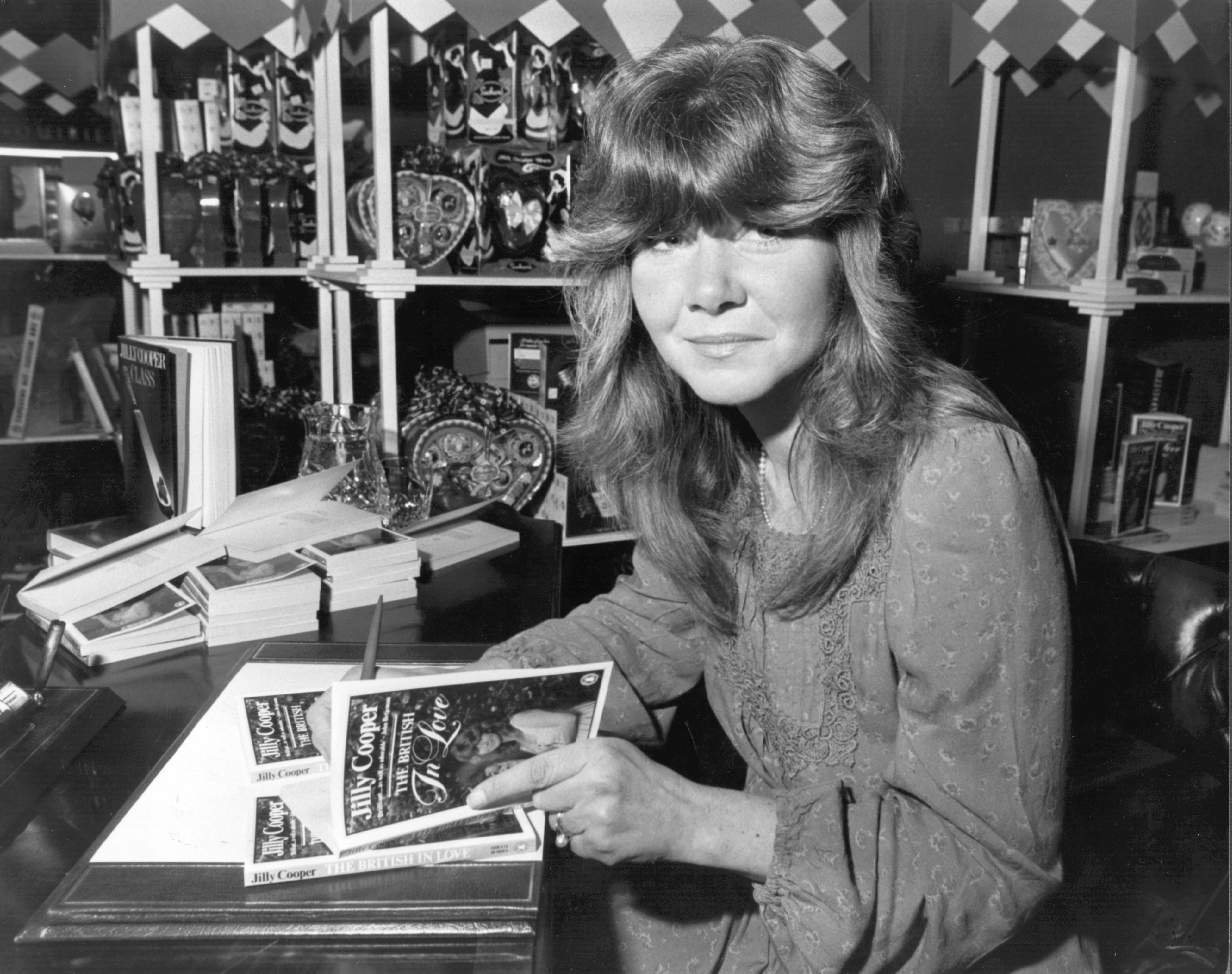 Signing copies of her anthology The British in Love at Barkers department store in Kensington, London