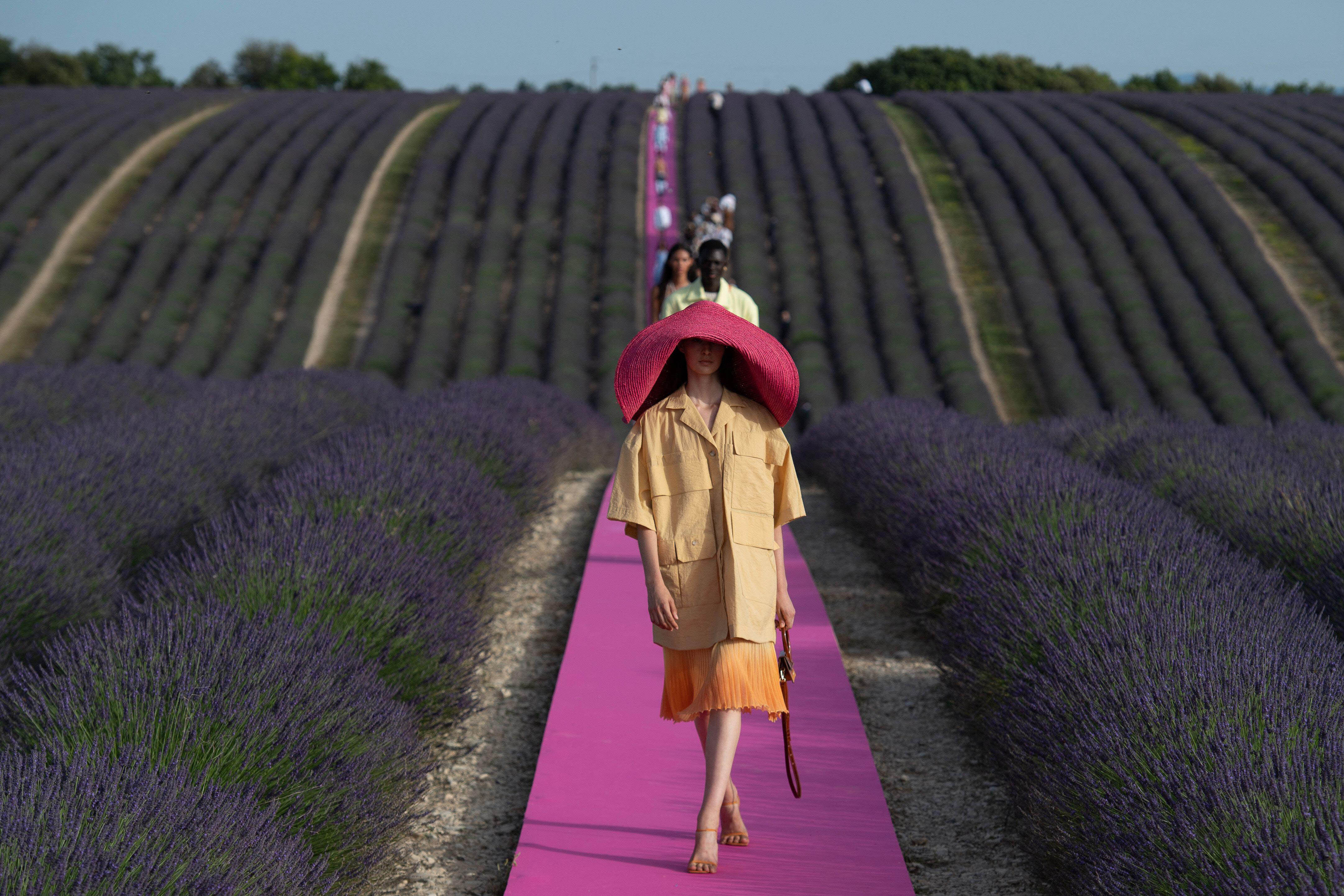 Jacquemus SS20 Held in a dreamlike field of lavender in Provence, French designer Simon Porte Jacquemus’s Spring/Summer 2020 show marked the brand’s 10th anniversary. A front row of iPhone-snapping fashion press, influencers and celebrities bristled with excitement, as models made their way down a mile-long, hot pink runway in oversized tailoring and colourful straw hats. Porte Jacquemus is often pegged as one of fashion’s first designers to realise how powerful Instagram could be when marketing a product, harnessing social media hype with shows like these that went instantly viral. Sam Deaman