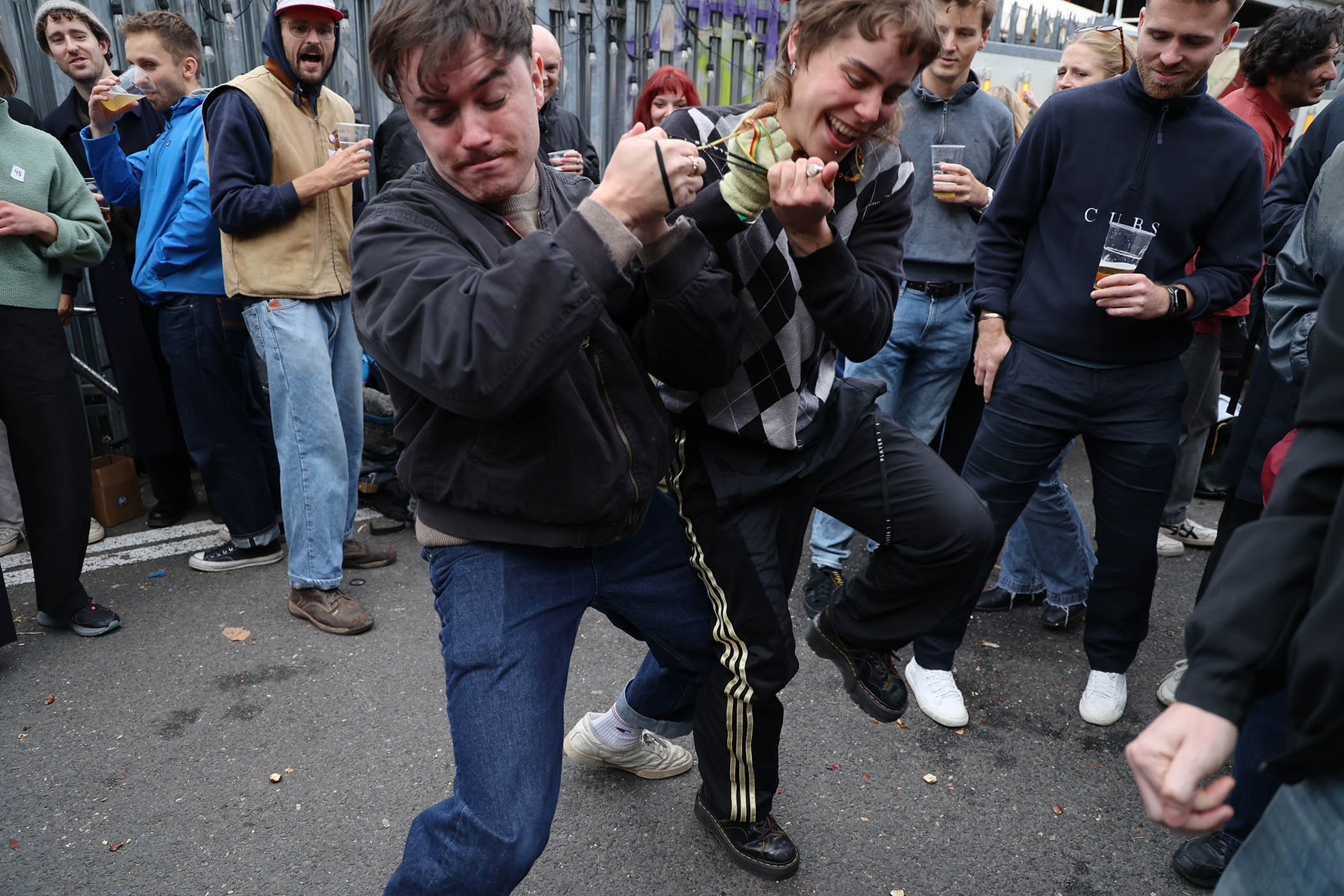 Competitors battle it out in the Peckham Conker Championships. Main image: Pietro the Pummeller wrestles a component to the ground