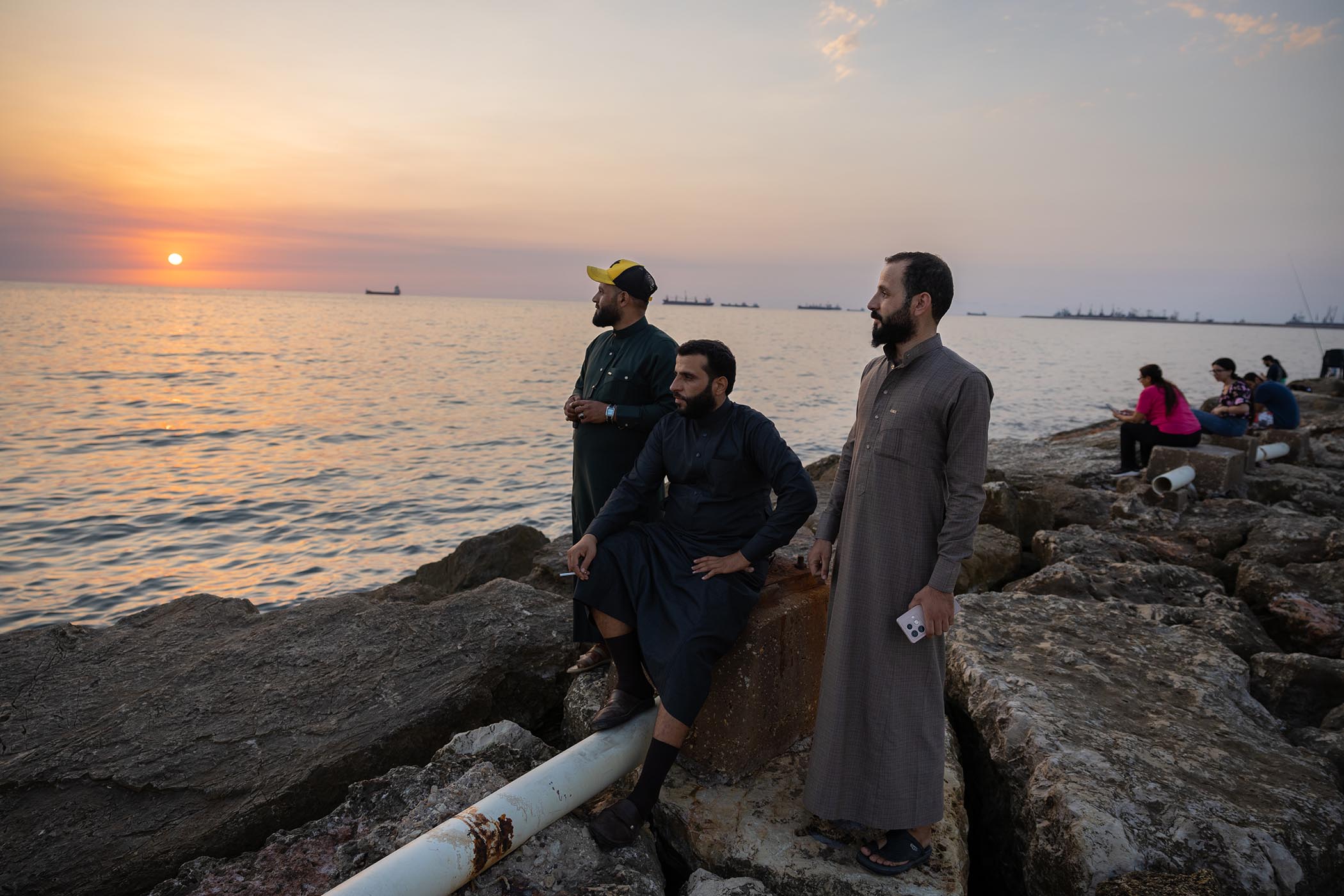 Ahmed, Faraj and Abdallah view the sunset having made the 230 mile trip from Raqqa