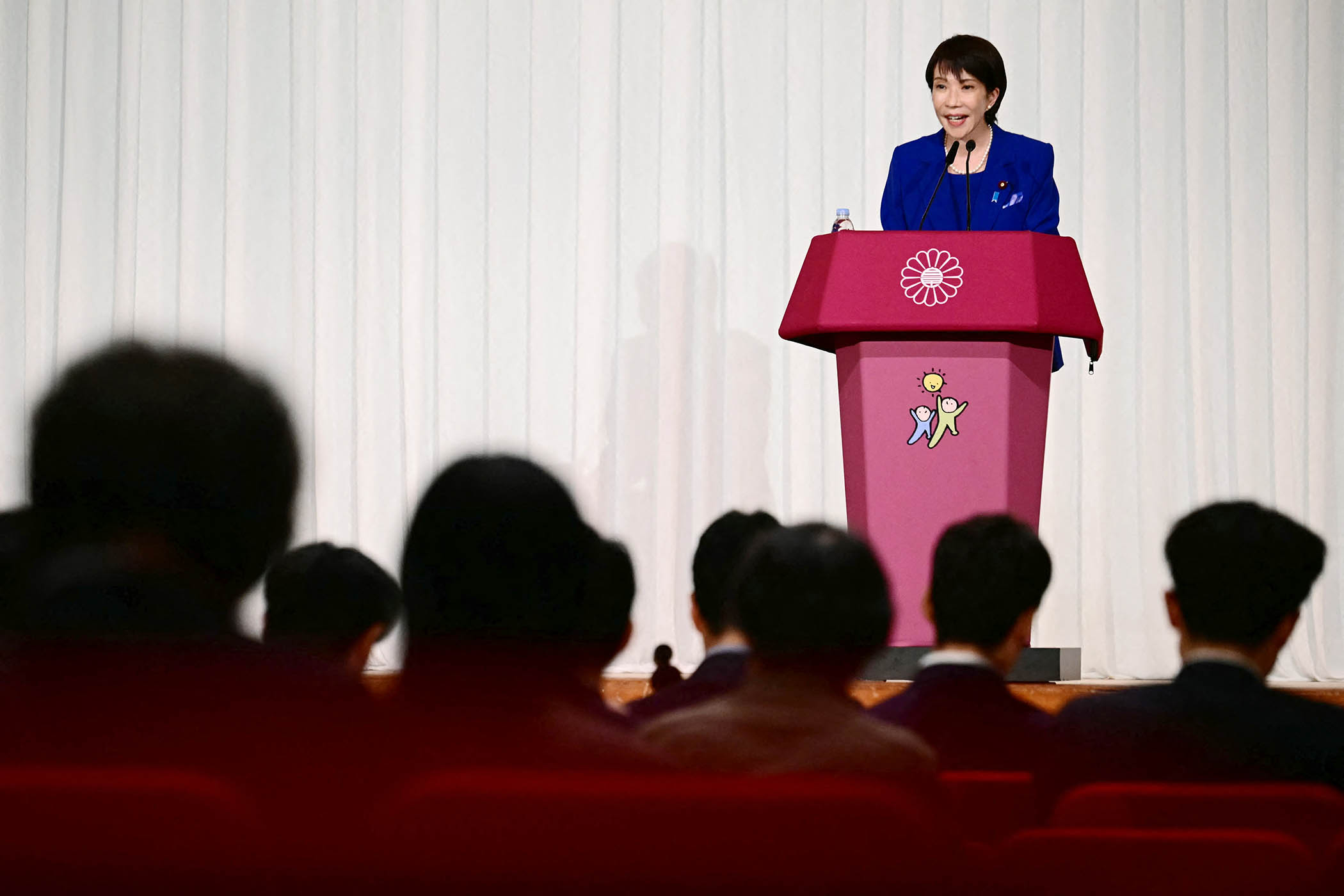 Japan’s Iron Lady will try to woo Trump with tough stance on immigrants