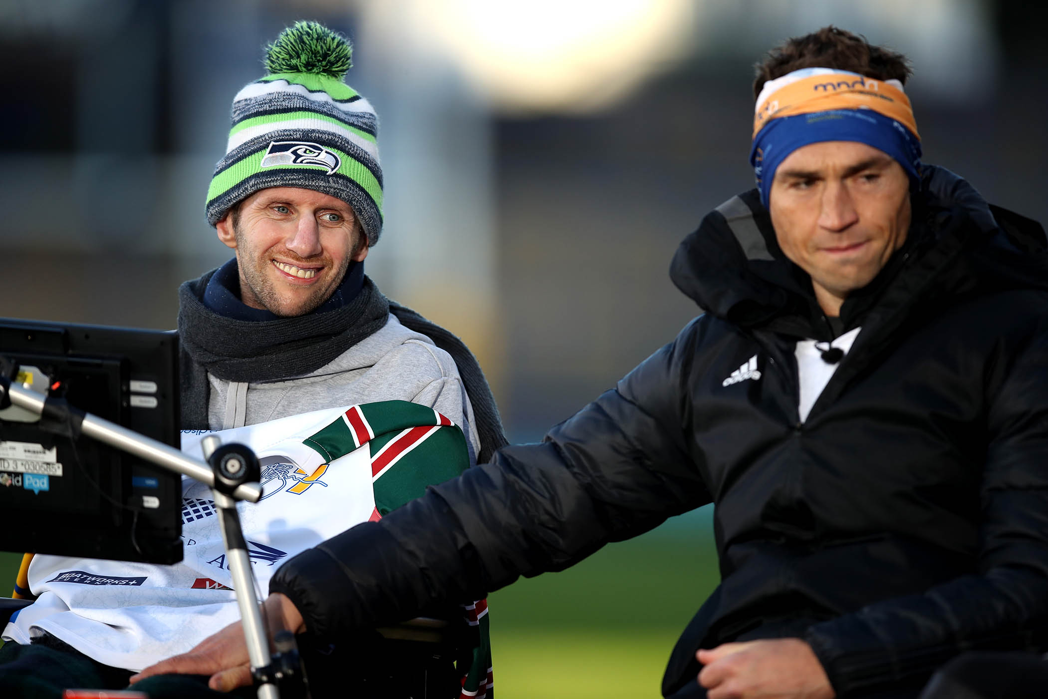 Kevin Sinfield with former teammate Rob Burrow after completing his Extra Mile Challenge at Emerald Headingley Stadium on 23 November 2021.
