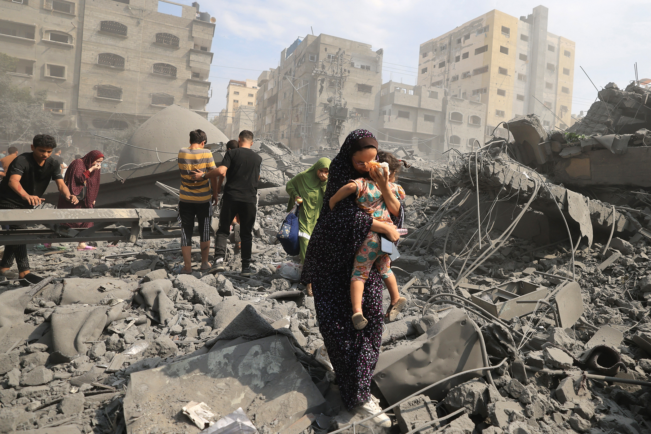 9/10/23: Palestinians evacuate following an Israeli airstrike on Al-Sousi mosque in Gaza City