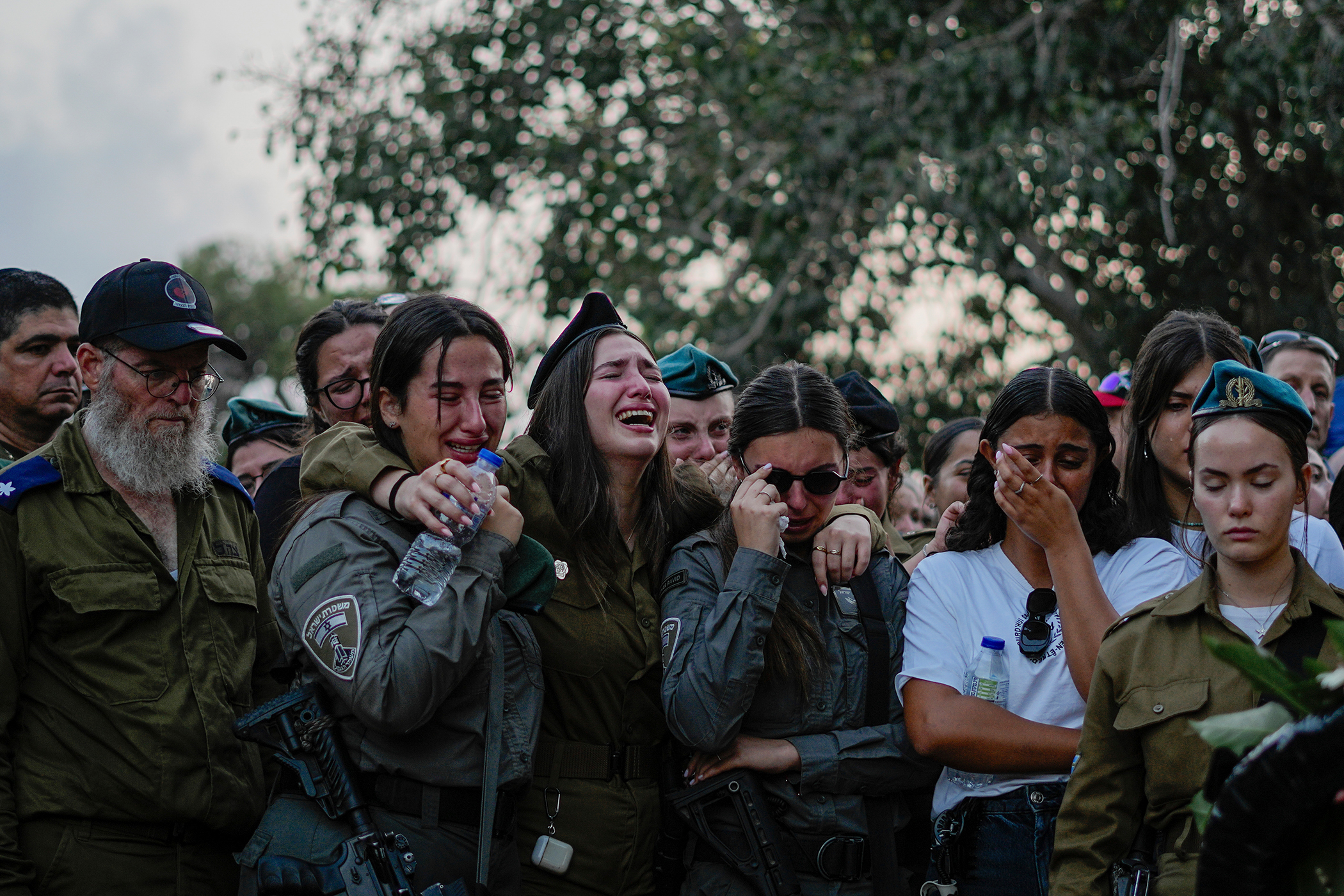 23/10/23: Mourners at the funeral of Yam Goldstein-Almog and her father, Nadav, in Kibbutz Shefayim, Israel