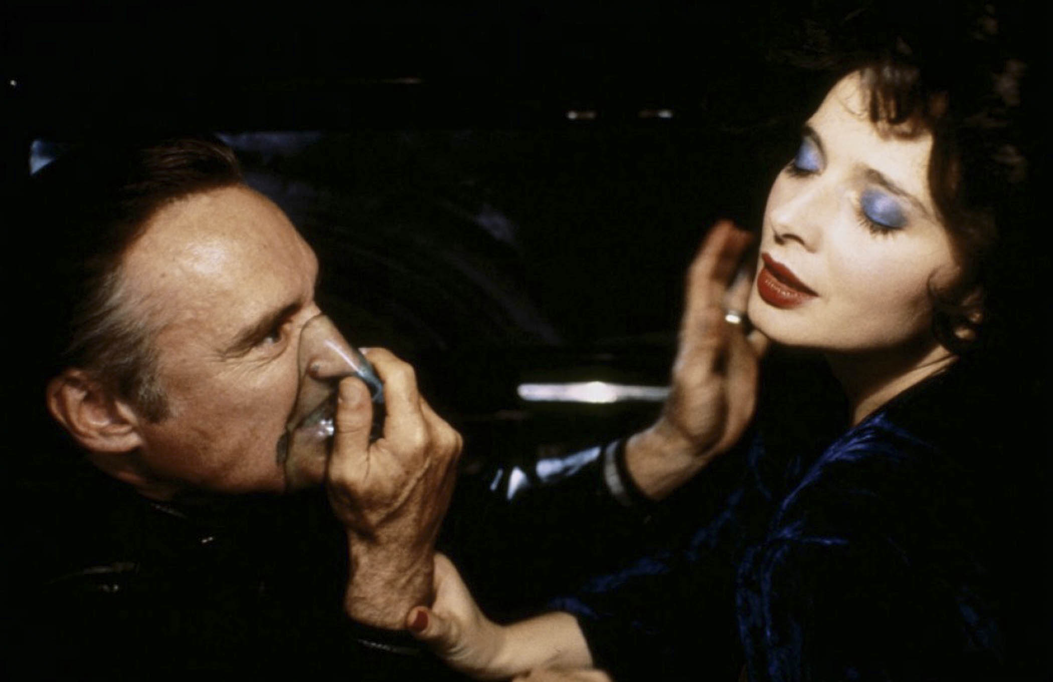 ‘Lynch was seen as the genius, she the muse’: Dennis Hopper and Isabella Rossellini in Blue Velvet. Main image: David Lynch on the set of Mulholland Drive with Naomi Watts and Laura Harring