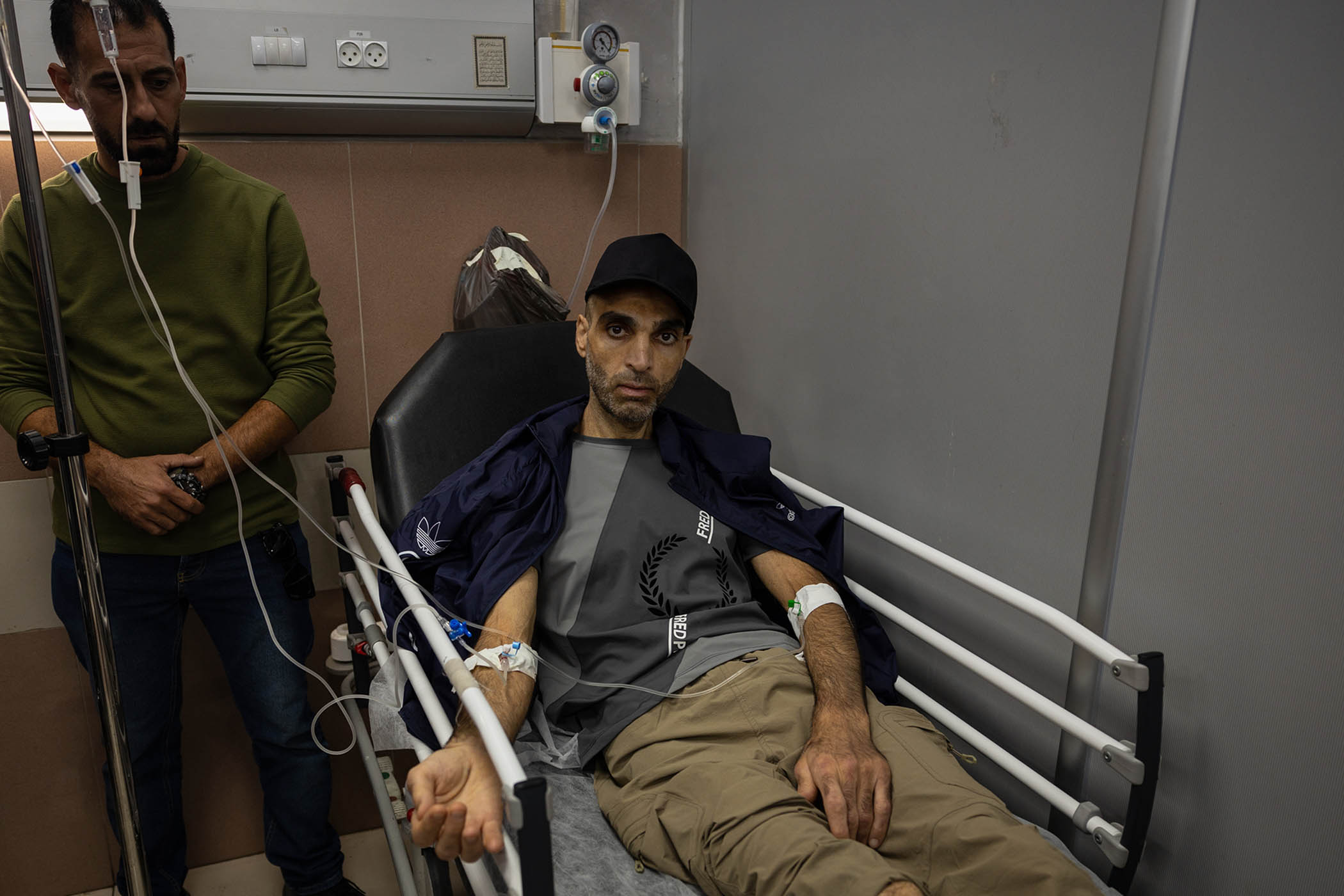 Samer Abu Diyak, 42, lies in Ramallah Hospital in the West Bank after receiving medical treatment following his release from Ofer prison in Israel