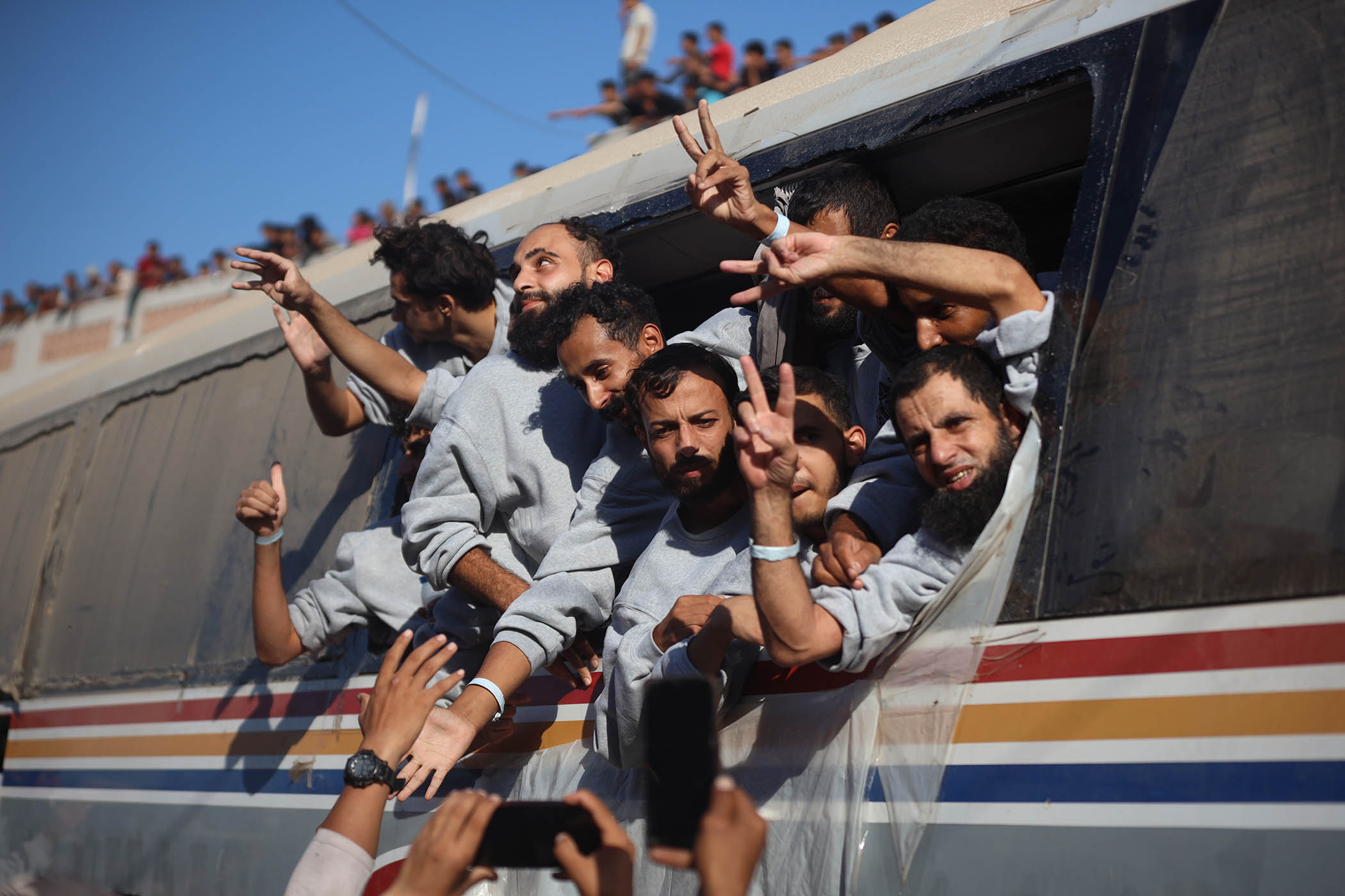 Freed Palestinian prisoners embrace their families – with tears, relief and fresh bruises
