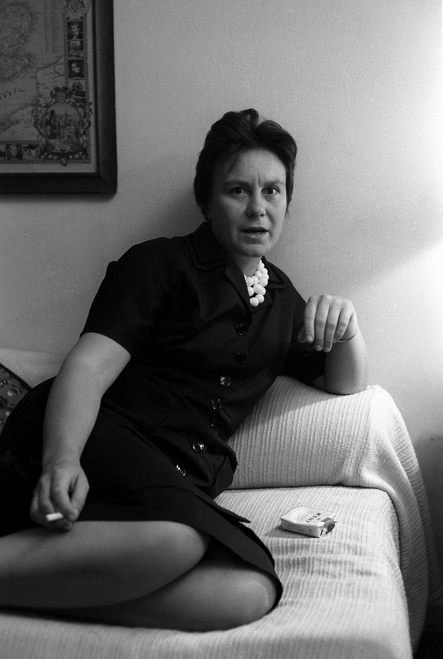 Above: Harper Lee photographed in her New York apartment, July 1960; main pic: Lee visiting her home town of Monroeville, Alabama, the following year.