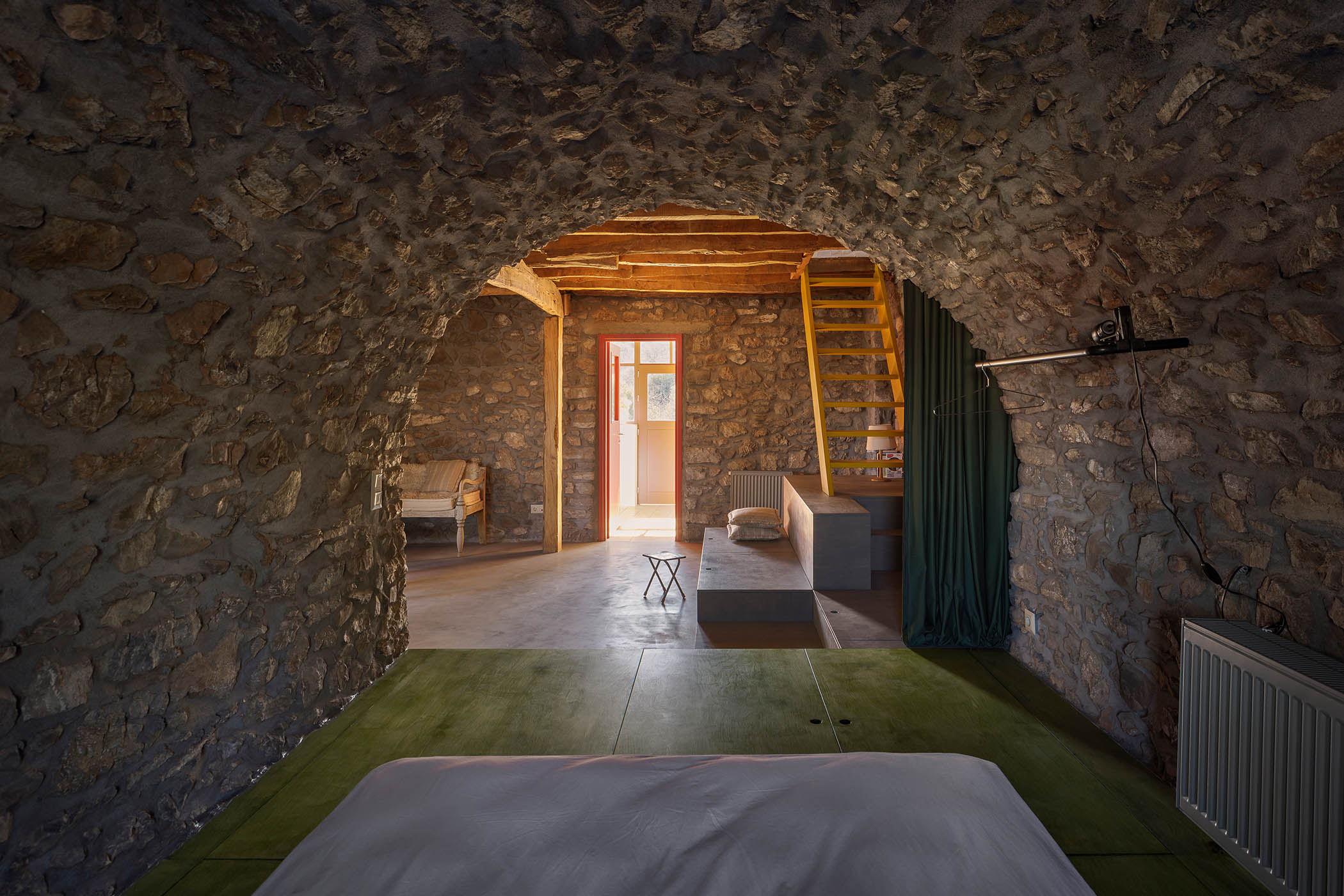Retro vision: many original features have been kept, including roughcast walls and rickety windows upstairs. Stone arches on the lower level were once used for storing bales of hay and livestock