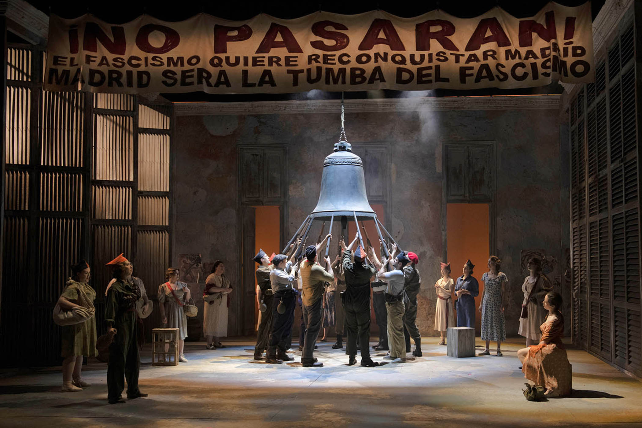 The cast and chorus of Le Trouvère. Main image: Lydia Grindatto  as Azucena and Eduardo Niave as Manrique, who leads the republicans