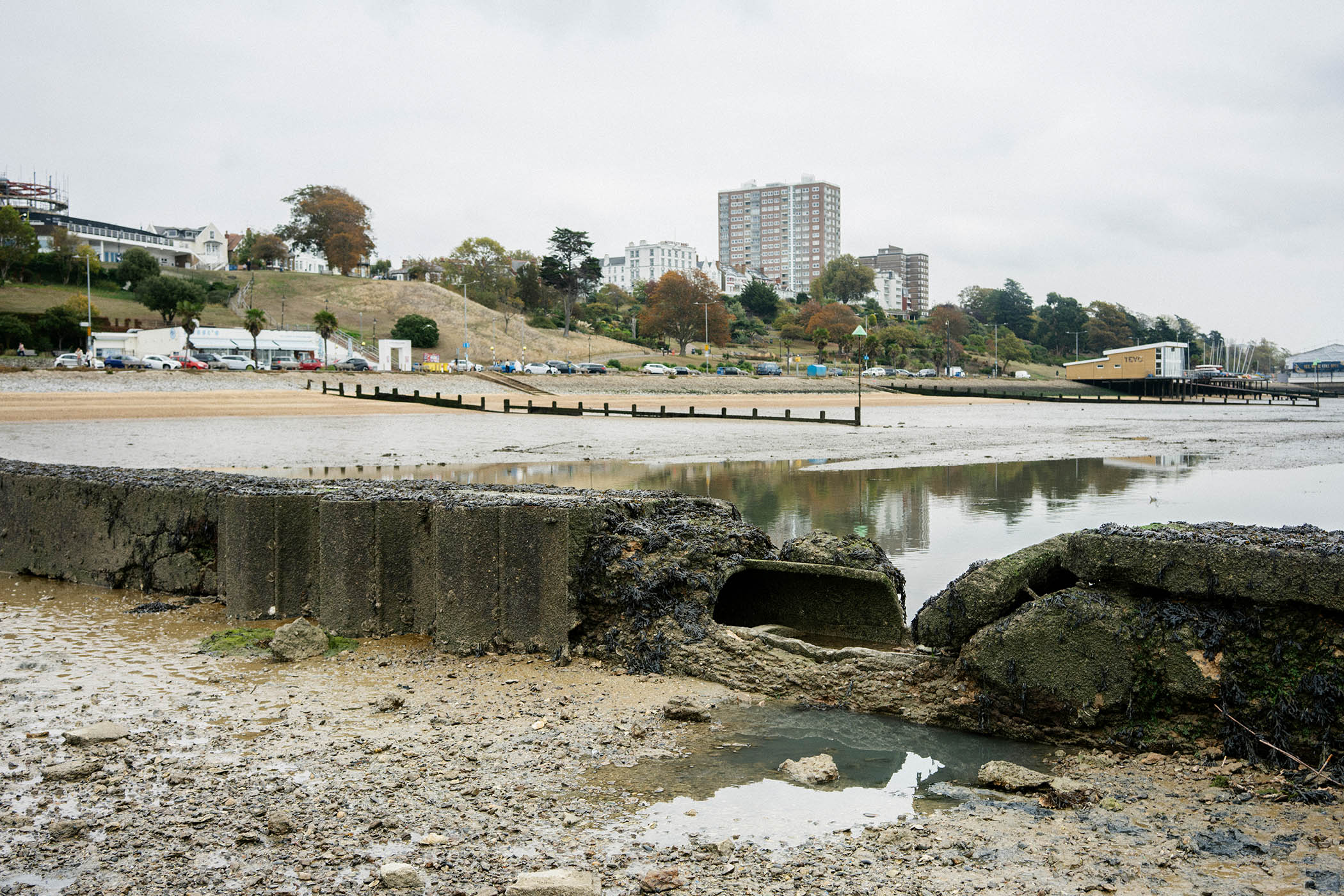 A damaged pipe maintained by Anglian Water on a beach beside a popular bathing spot in Southend-on-Sea