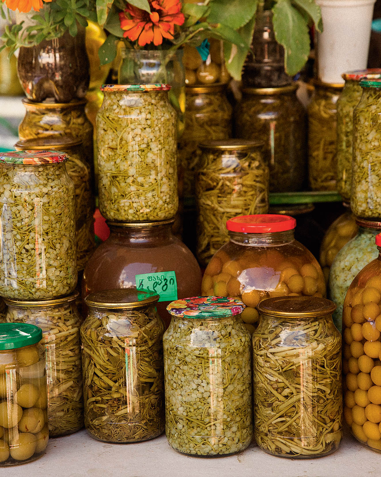 Jars of jonjoli, or pickled wild caper berries, at Dezerter Bazaar