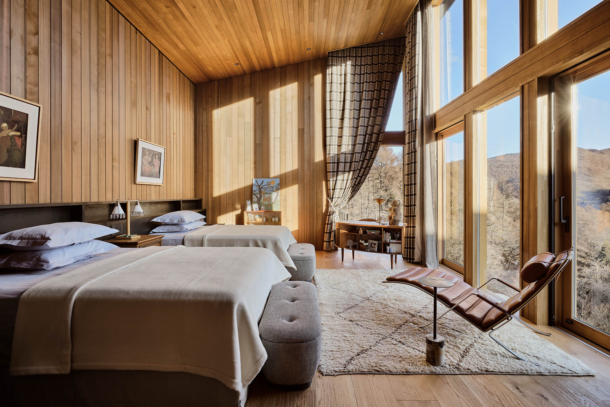 Lie back: the bedroom, where windows look straight on to the surrounding forest