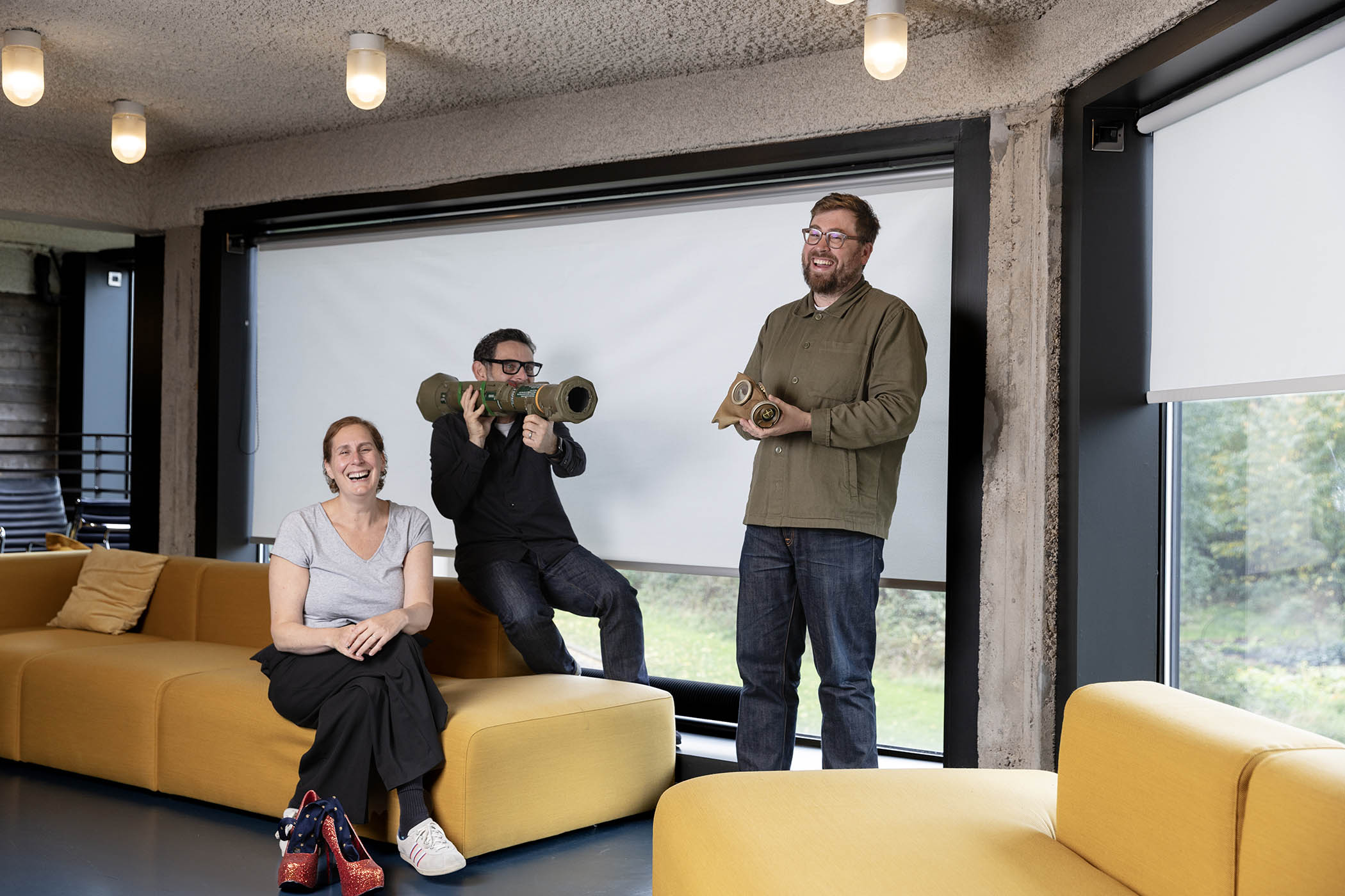Emily Feller, Niall Shamma and Peter Balm at Warp Films HQ, with props including a gas mask worn in 2004’s Dead Man’s Shoes