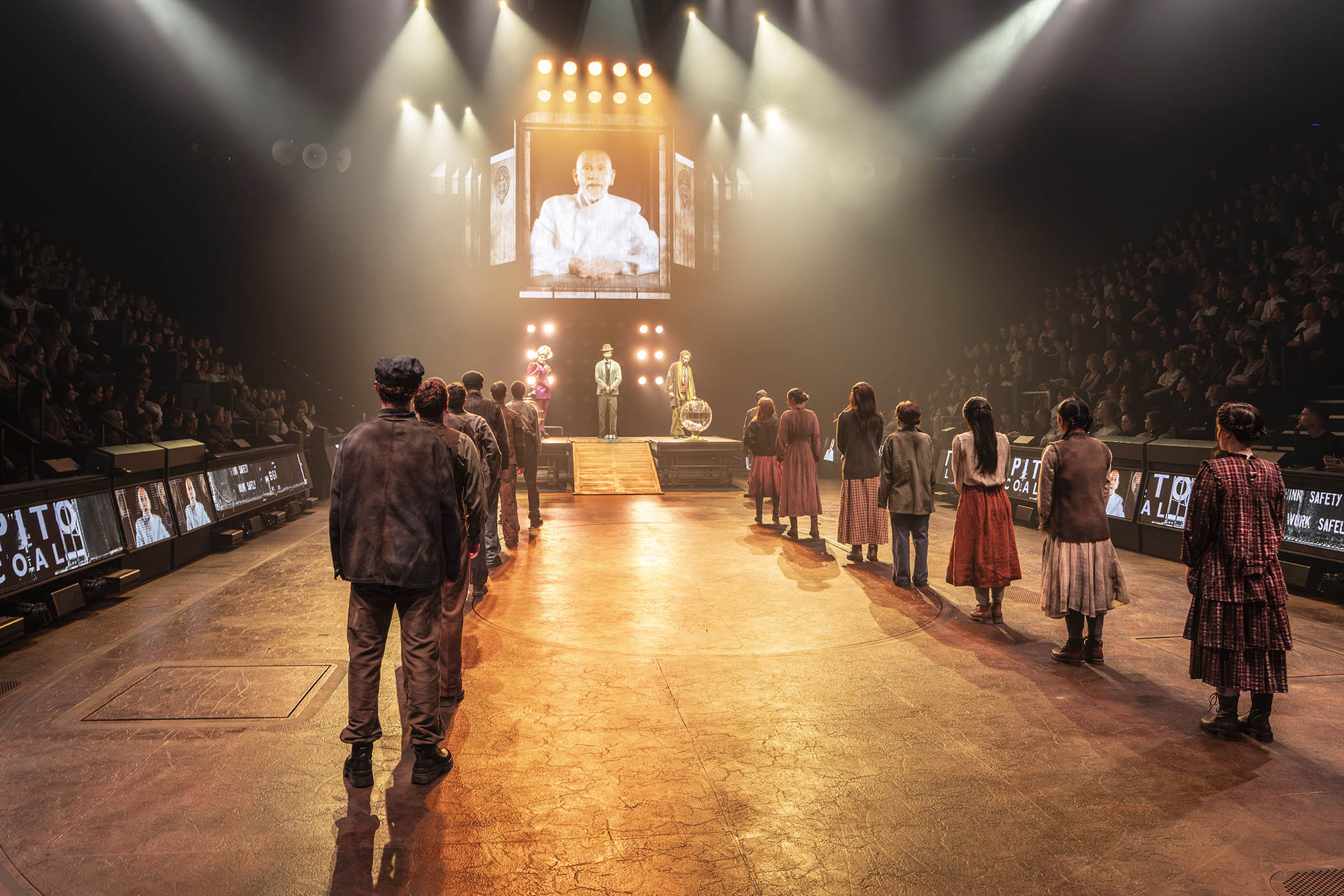 Complicity encouraged: a pre-recorded John Malkovich, as President Snow, phones it in on screen